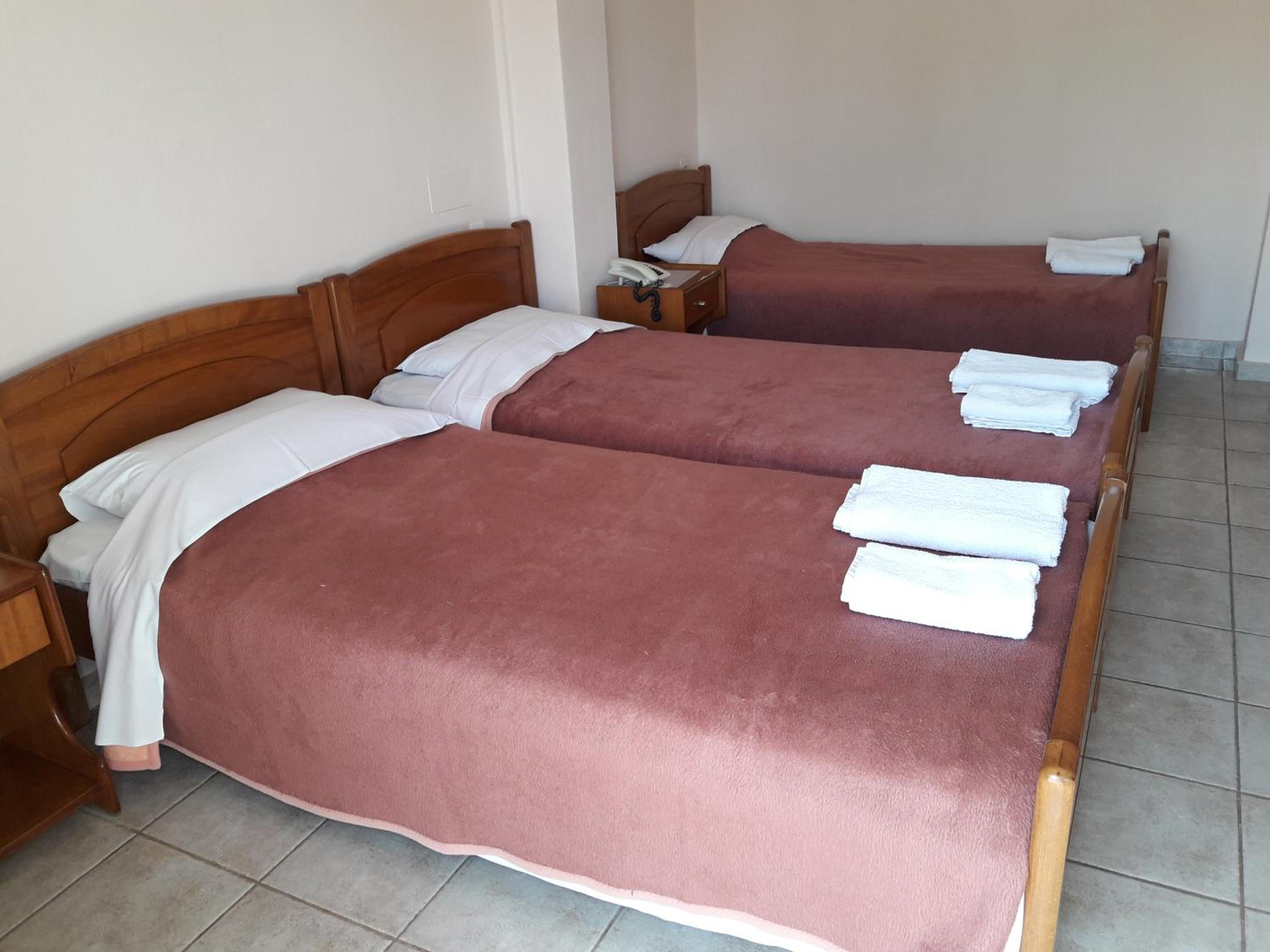 Triple Room with Single Beds and Side Sea View photo 3