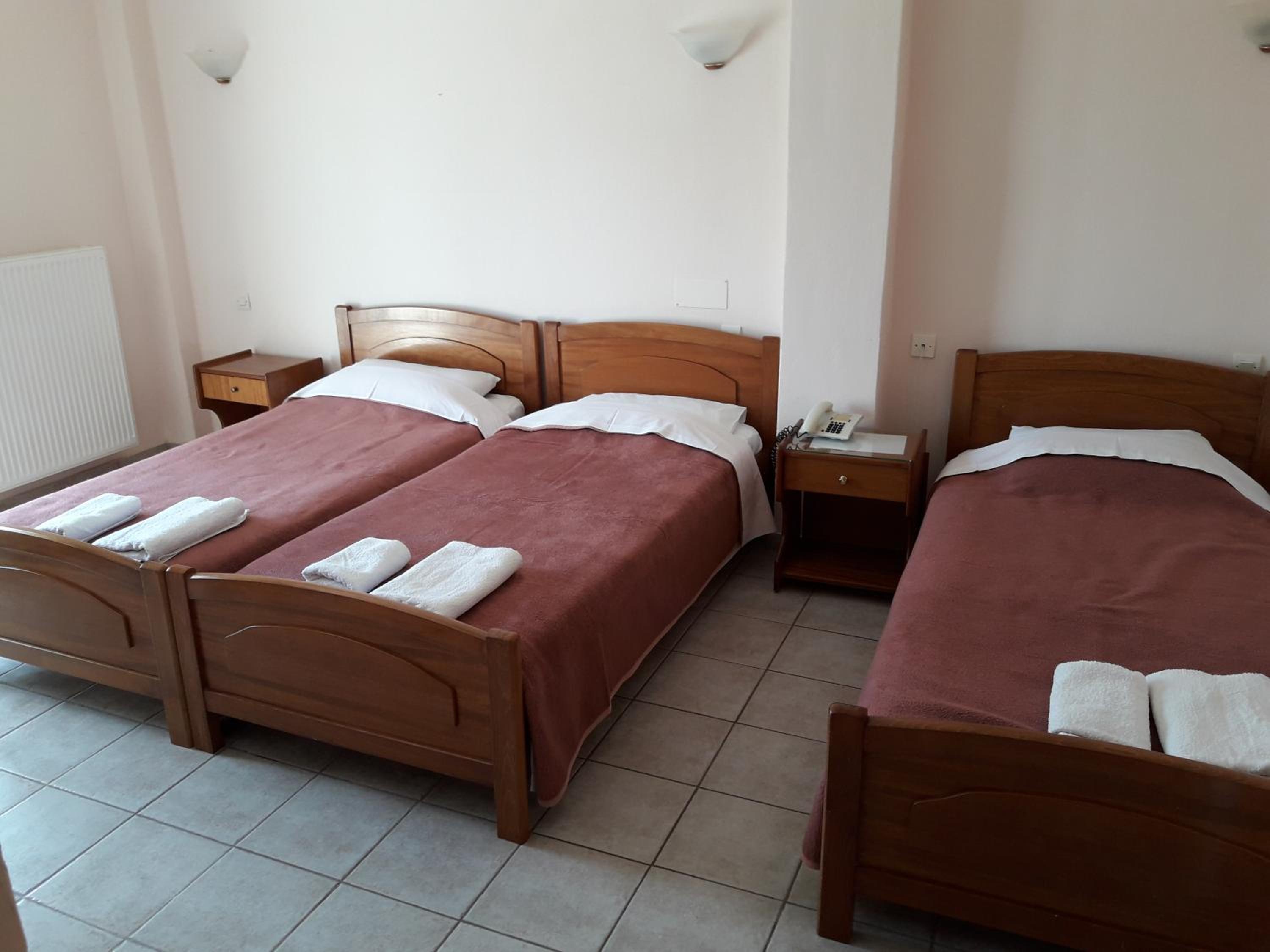 Triple Room with Single Beds and Side Sea View photo 1