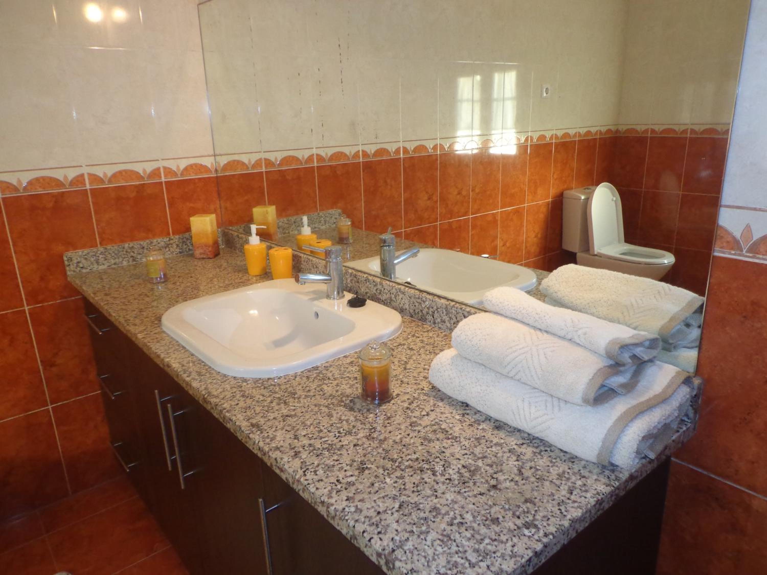 Four-Bedroom House - Photo 55
