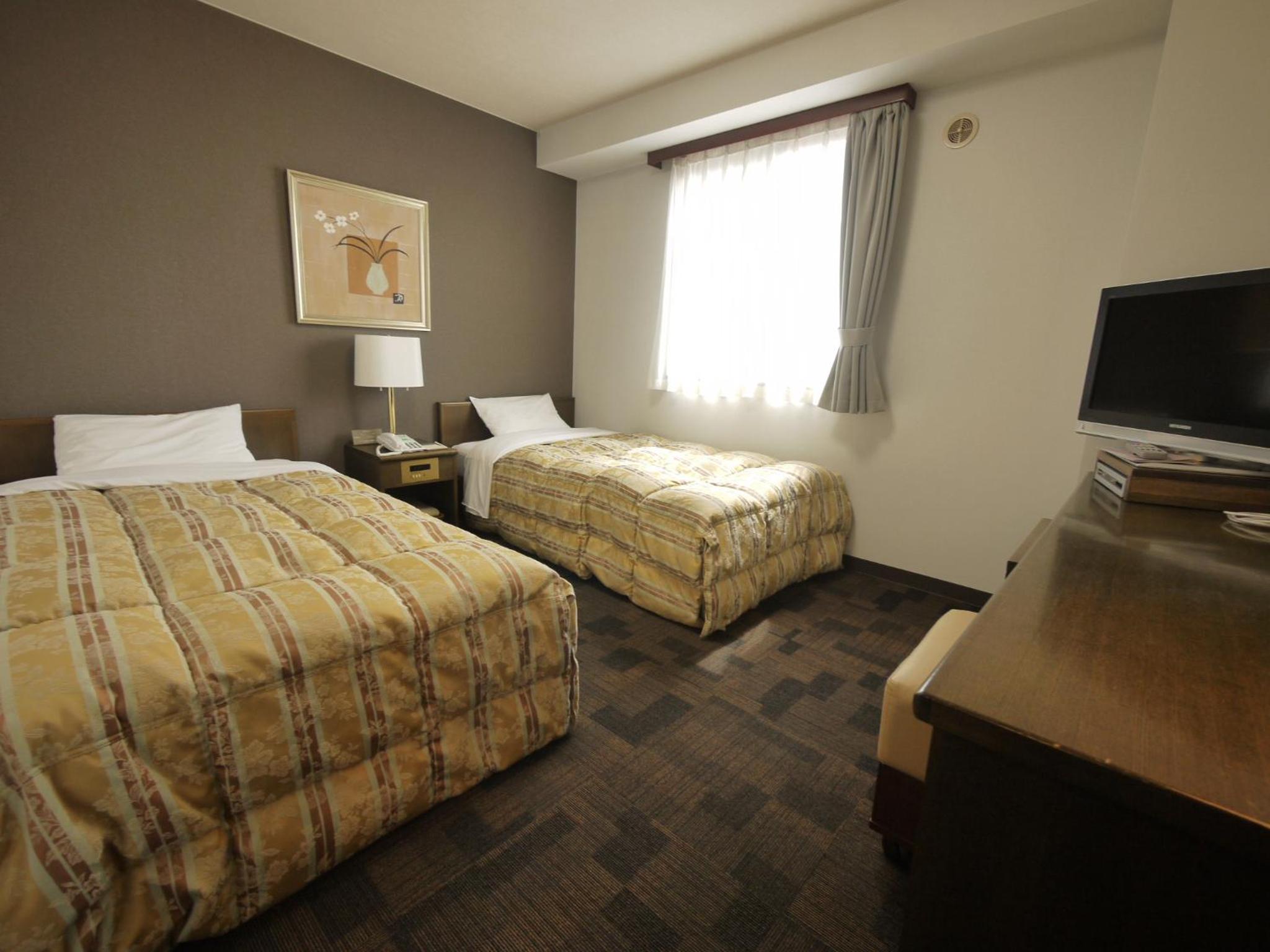 Twin Room - Non-Smoking - Photo 1