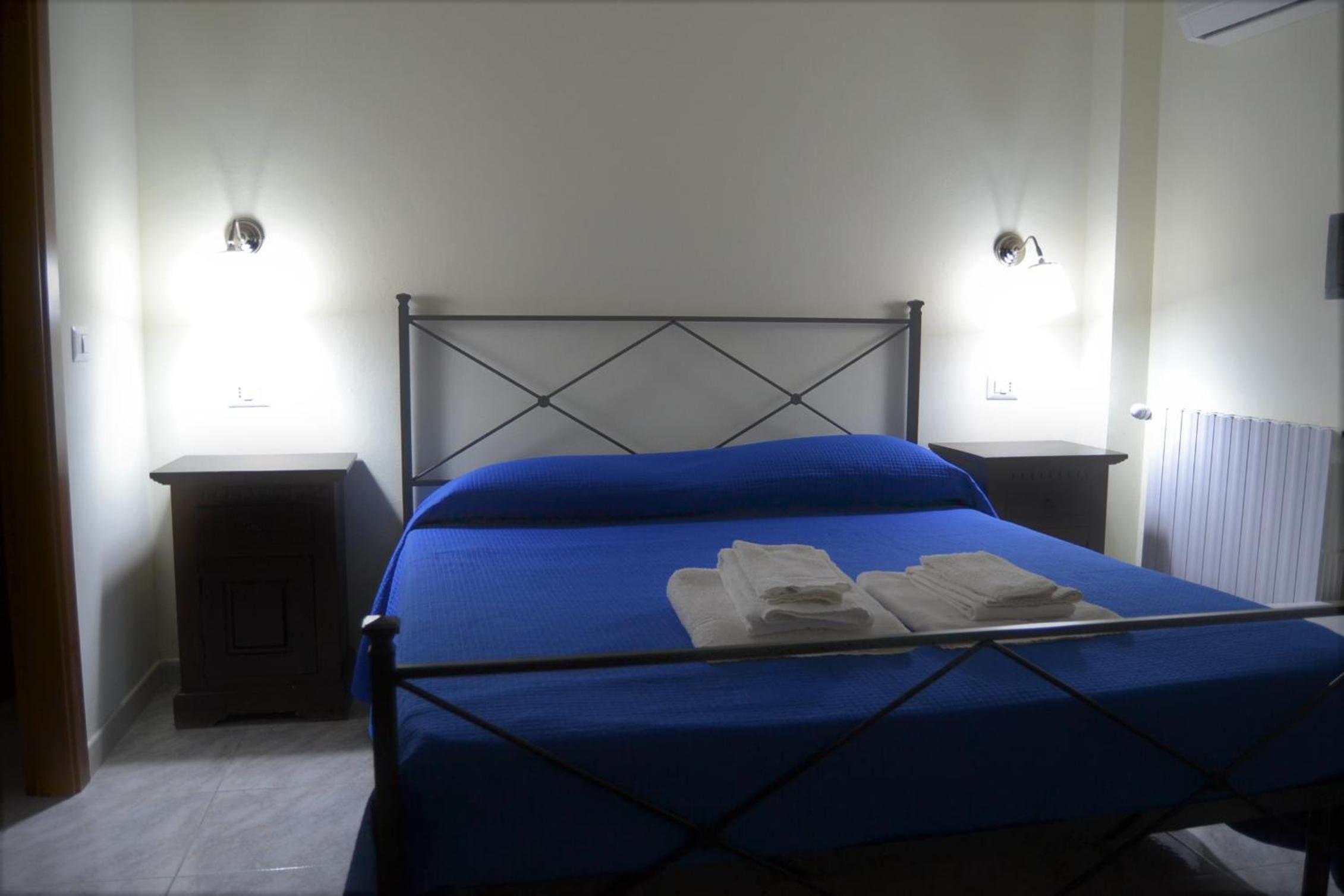Standard Quadruple Room - Photo 15