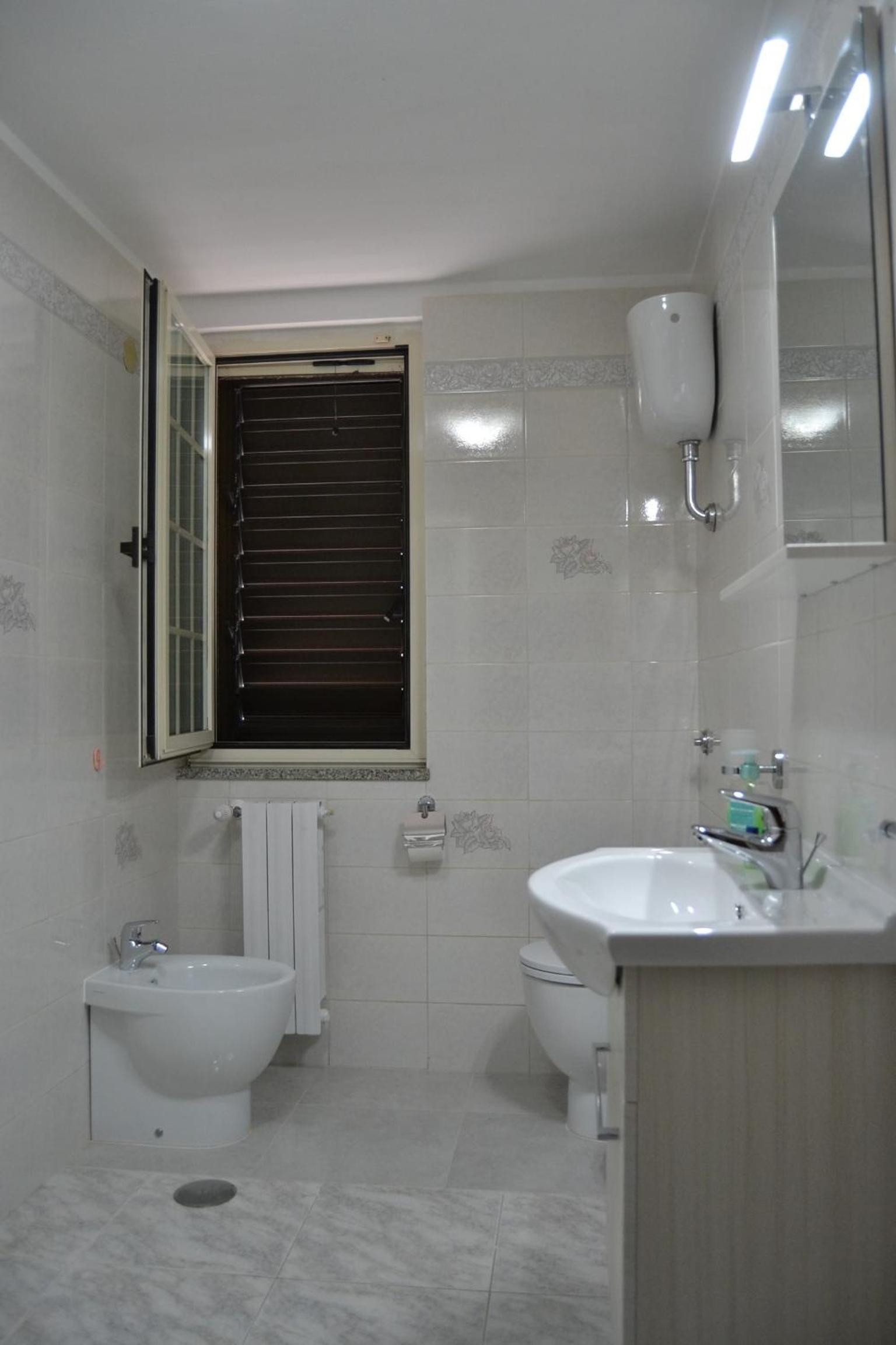 Standard Quadruple Room - Photo 24