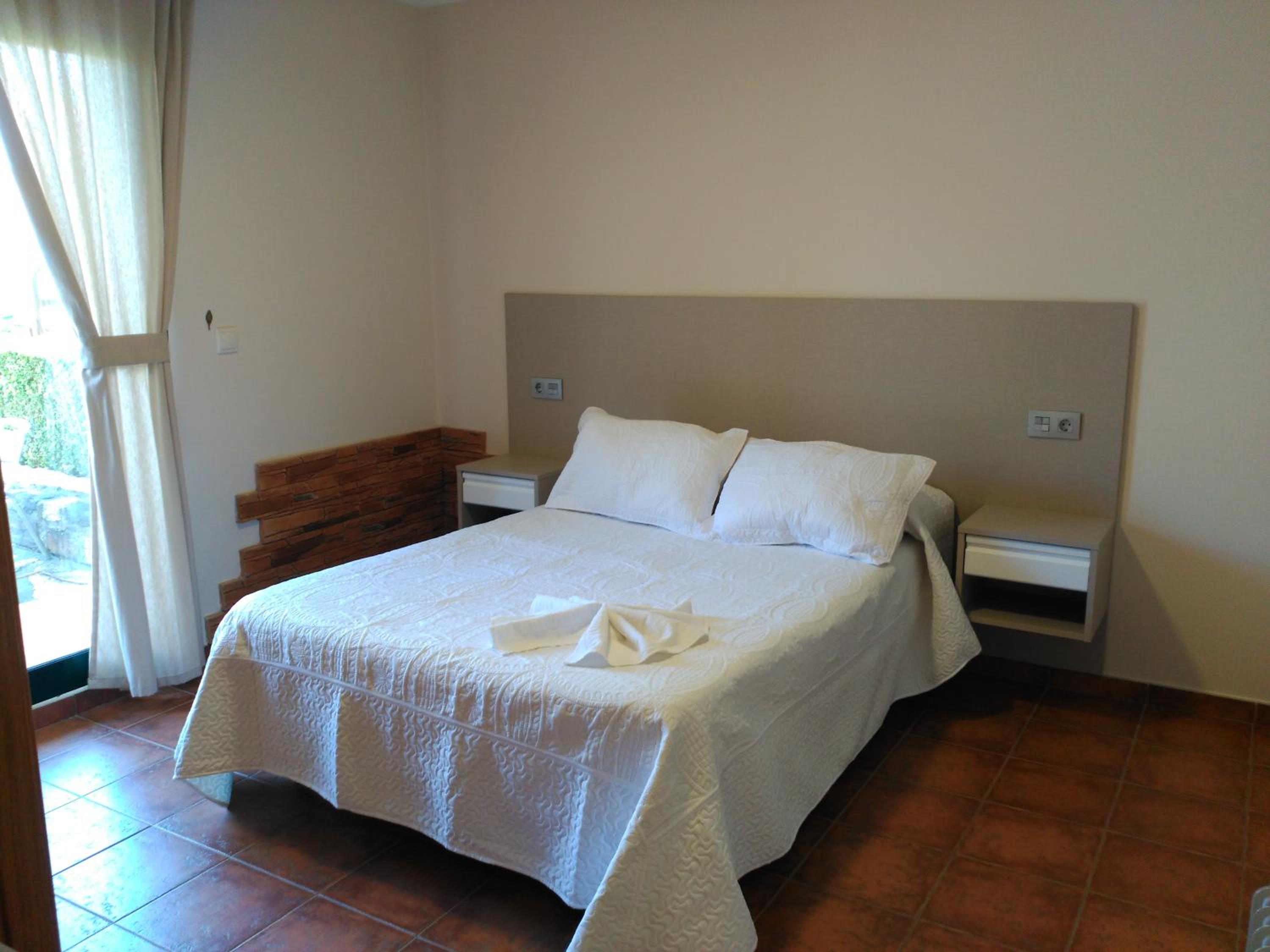 Apartamento de una habitación con terraza y vista al jardín