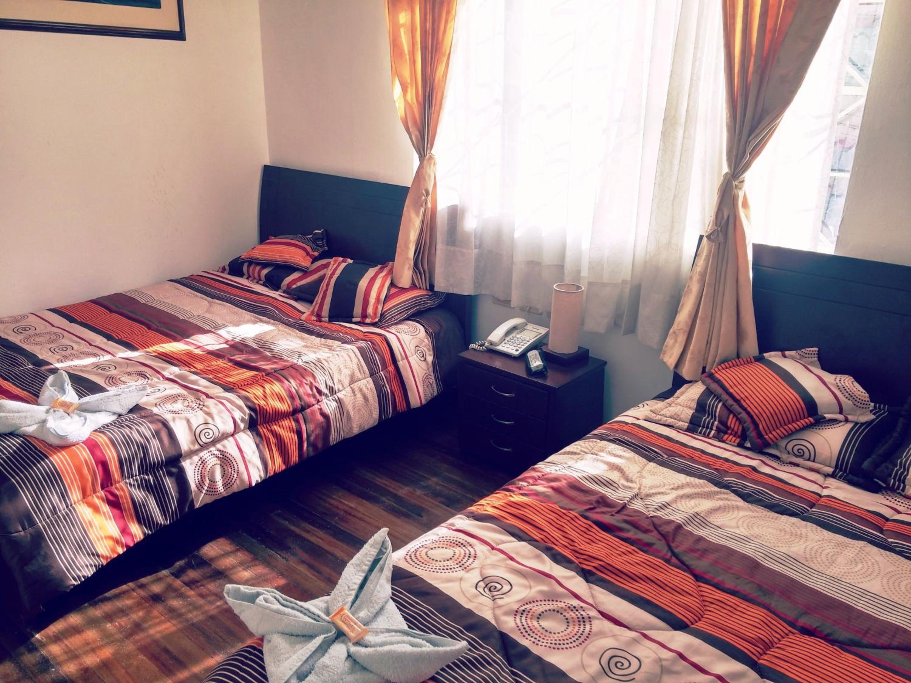 Quadruple Room with Shared Bathroom