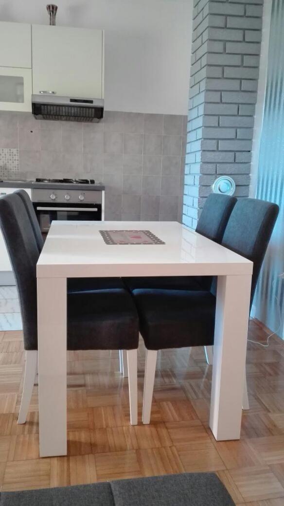 Three-Bedroom Apartment - Photo 11