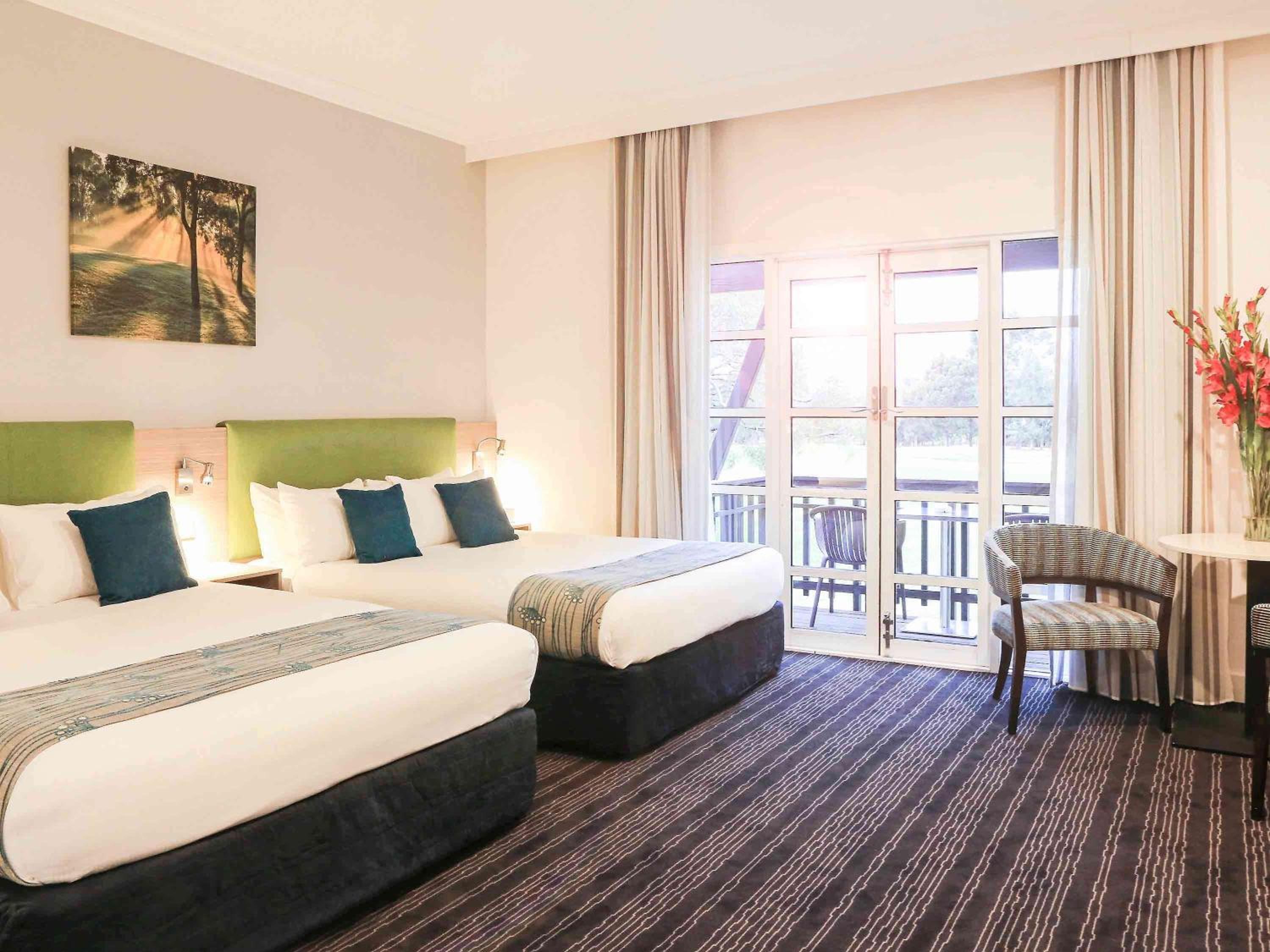 Standard Twin Room with Two Queen Beds - Photo 1