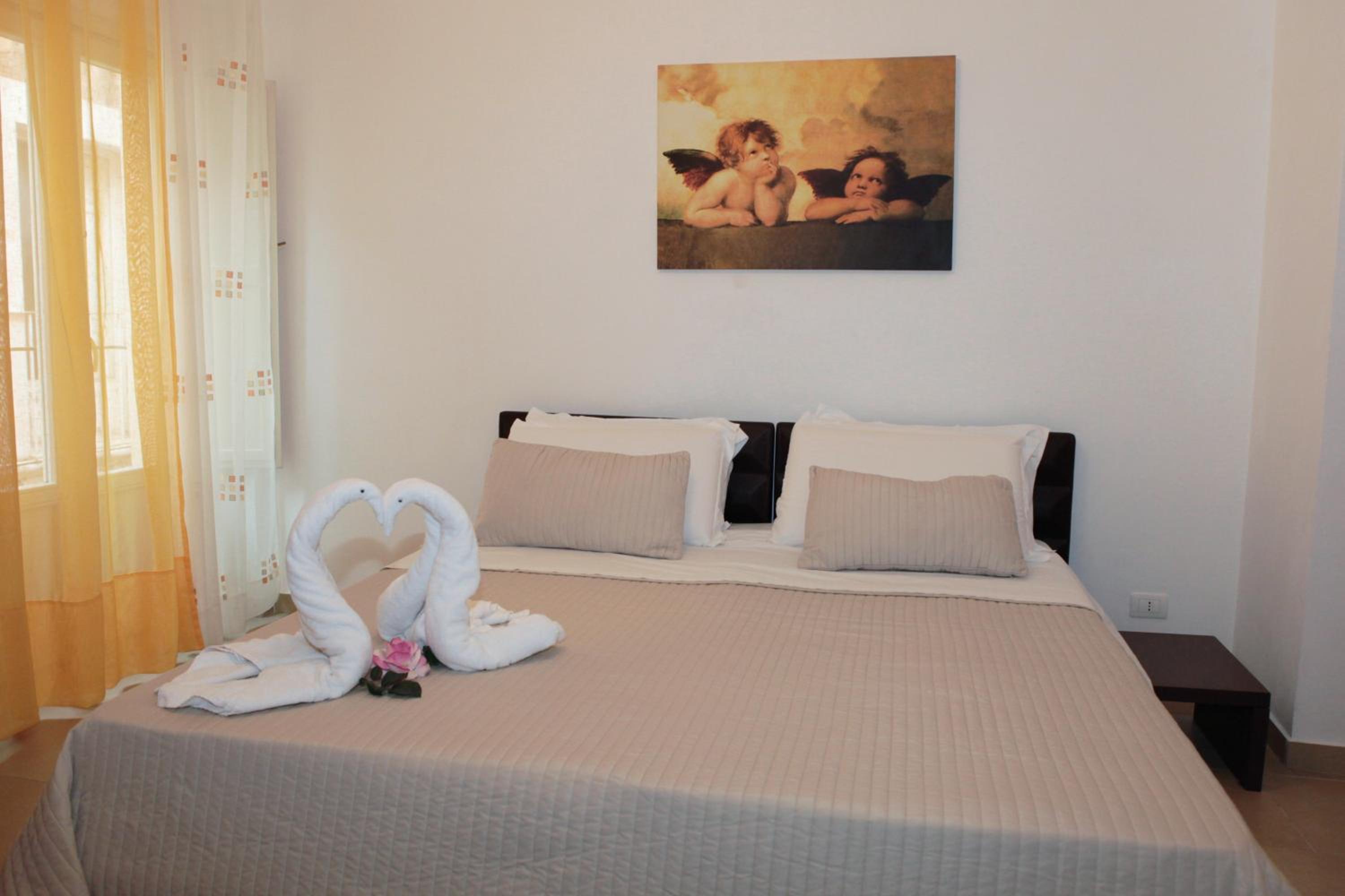 Quadruple Room - Photo 8