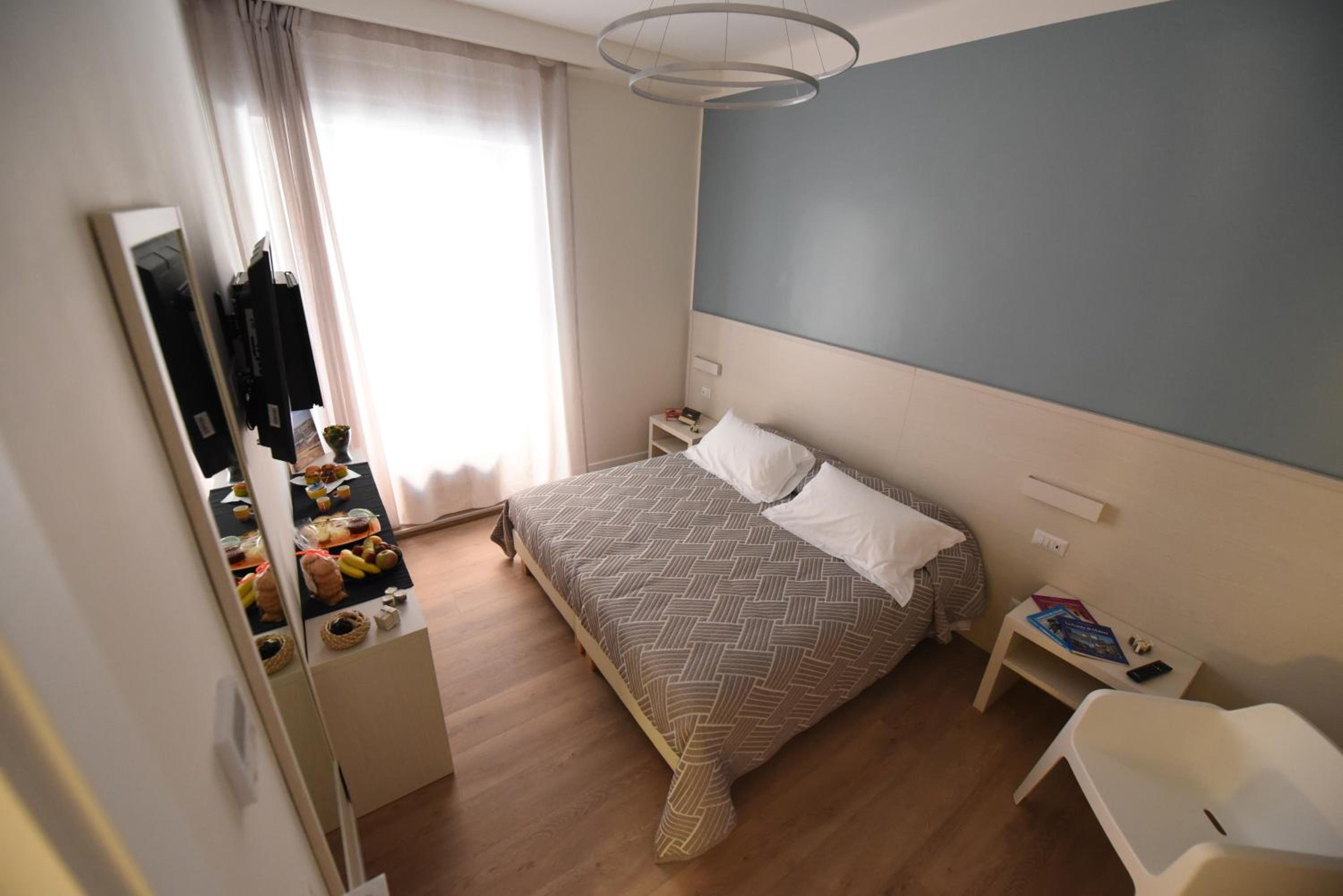 Quadruple Room with Private Bathroom