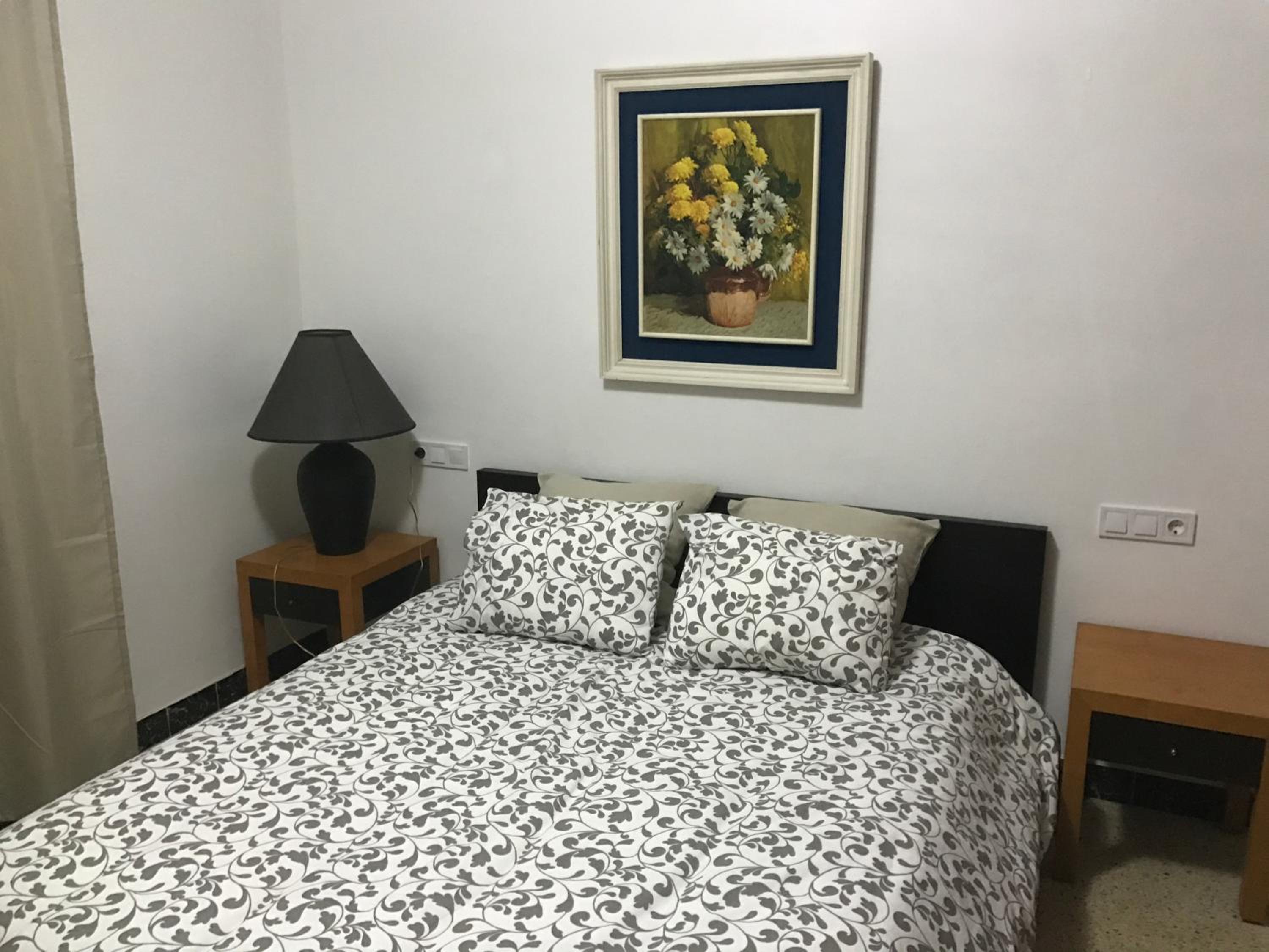 Habitación Queen con Baño Compartido