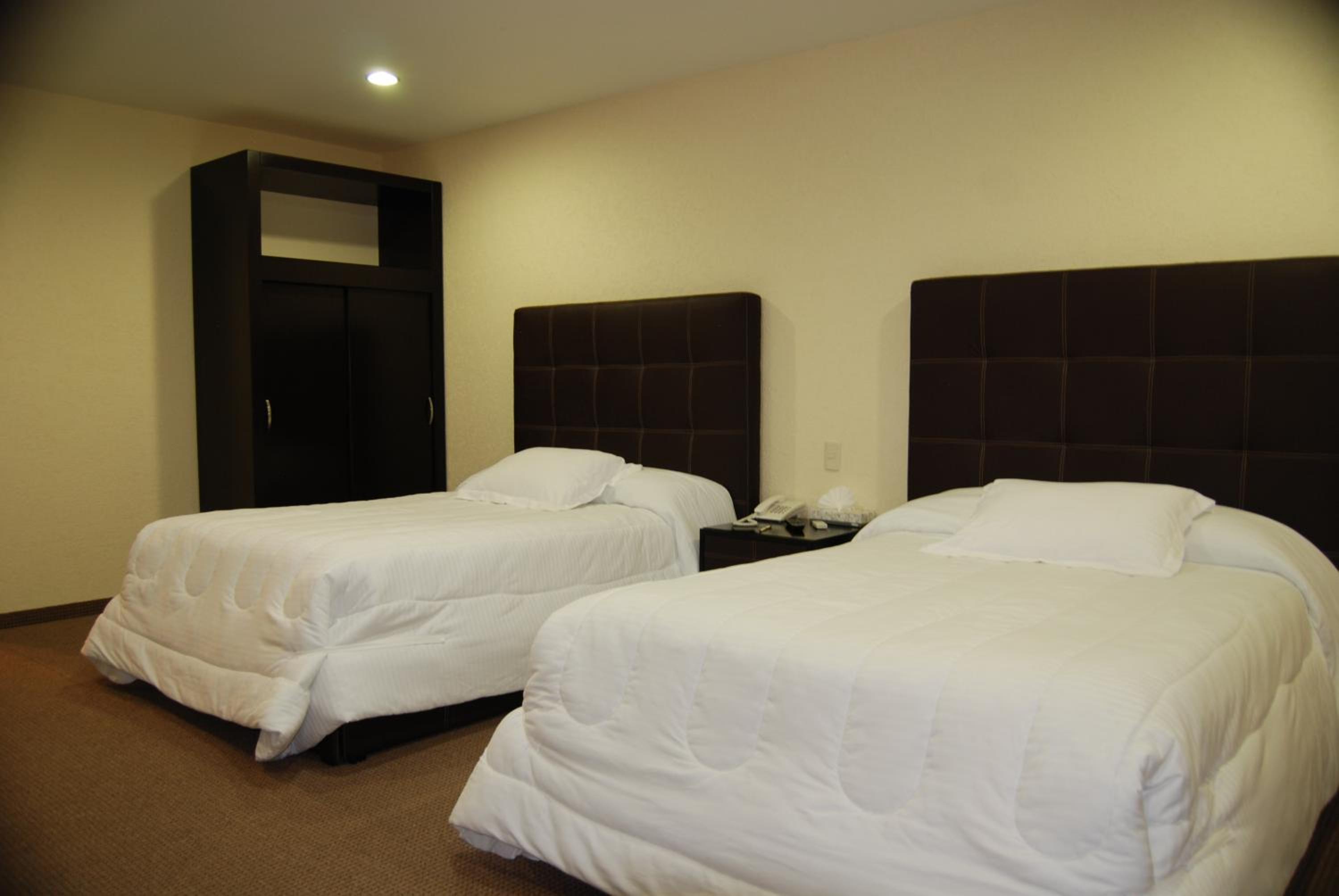 Twin Room - Photo 1