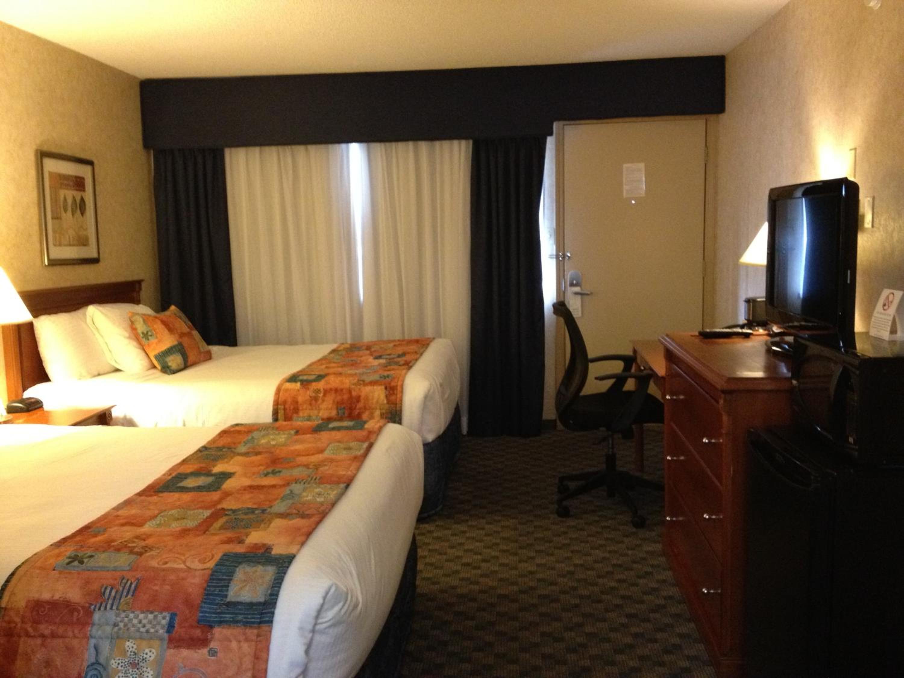 Queen Room with Two Queen Beds - Photo 1