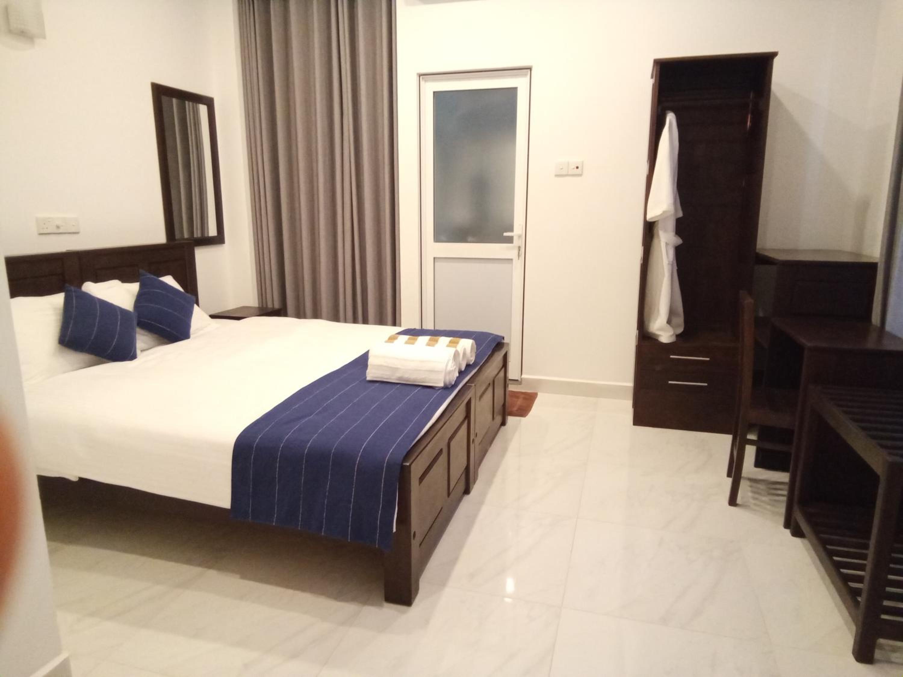 Double Room with Balcony (2 Adults + 1 Child)