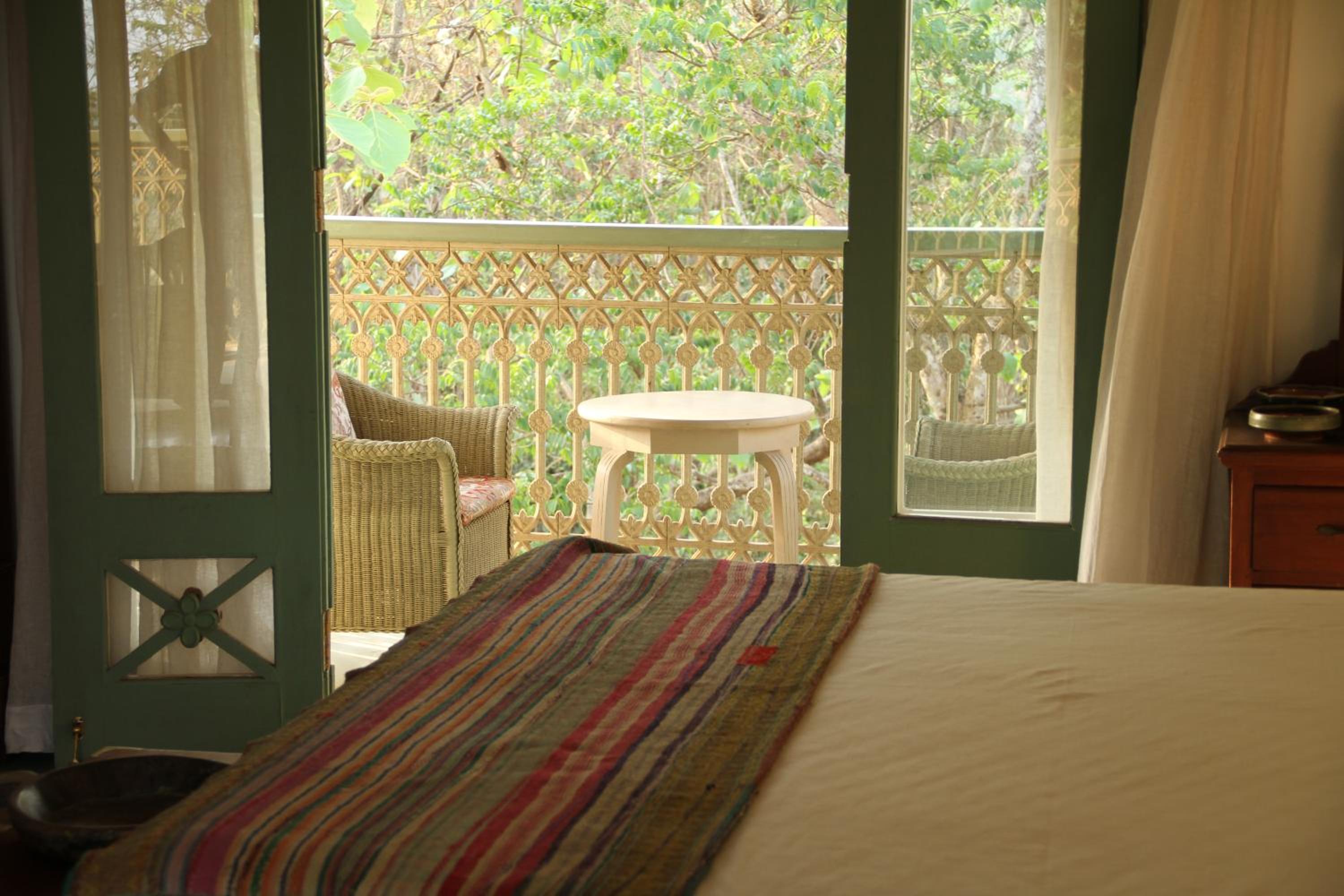 Mandovi River View Room - Two personalised Ayurvedic therapies. Restorative yoga sessions, Private consultations with our doctors
