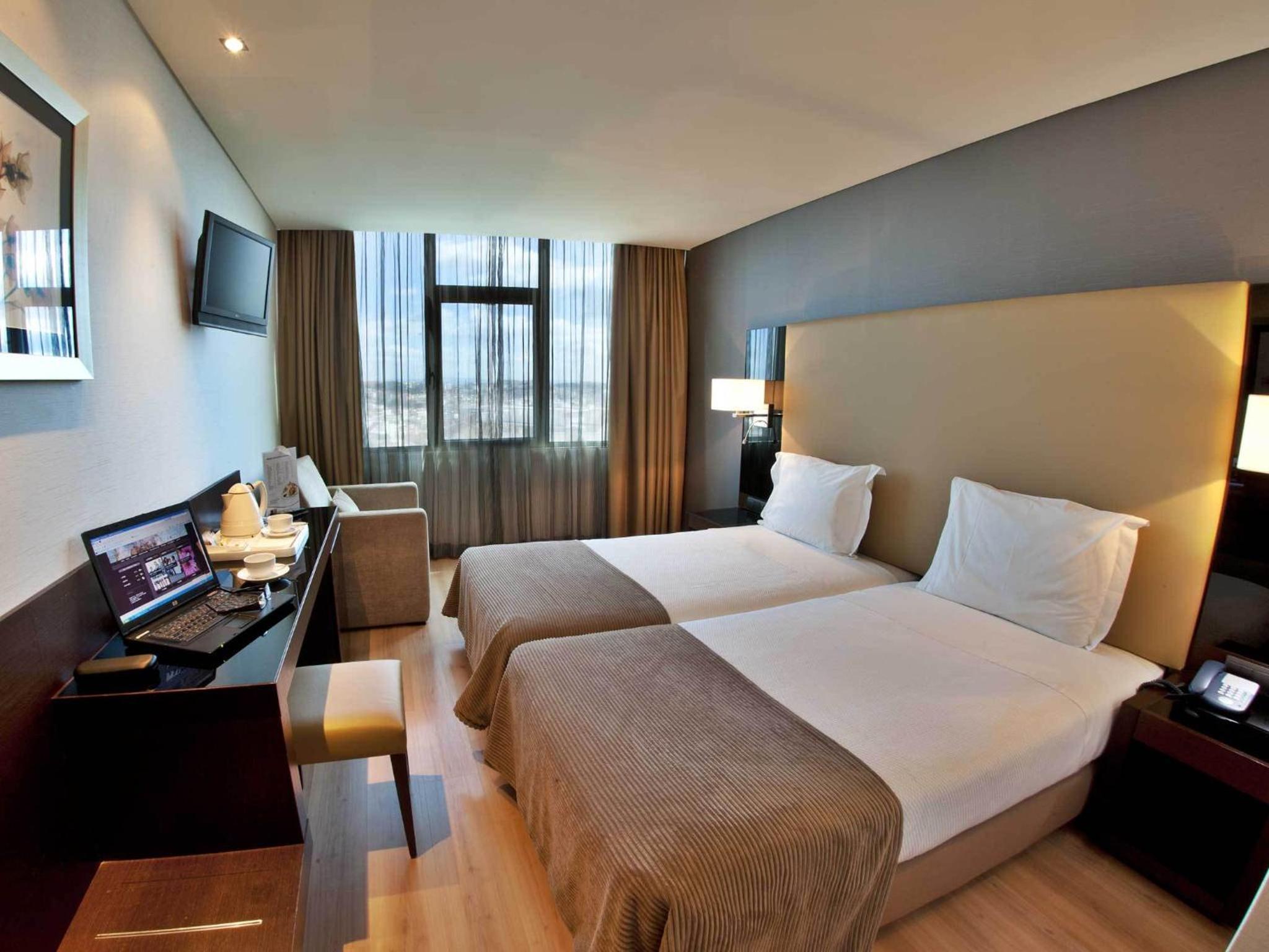 Twin Room - Photo 1