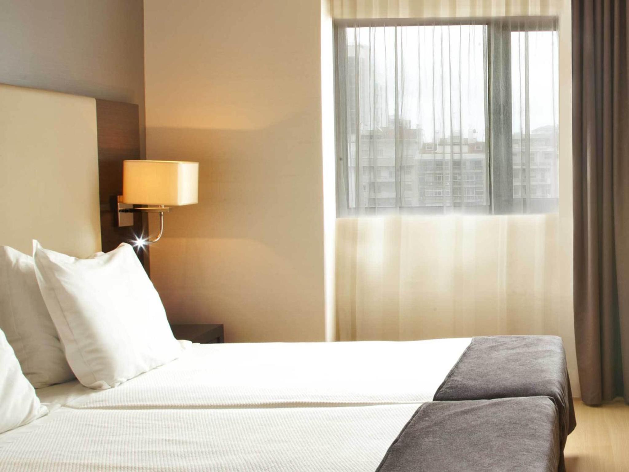 Twin Room - Photo 2