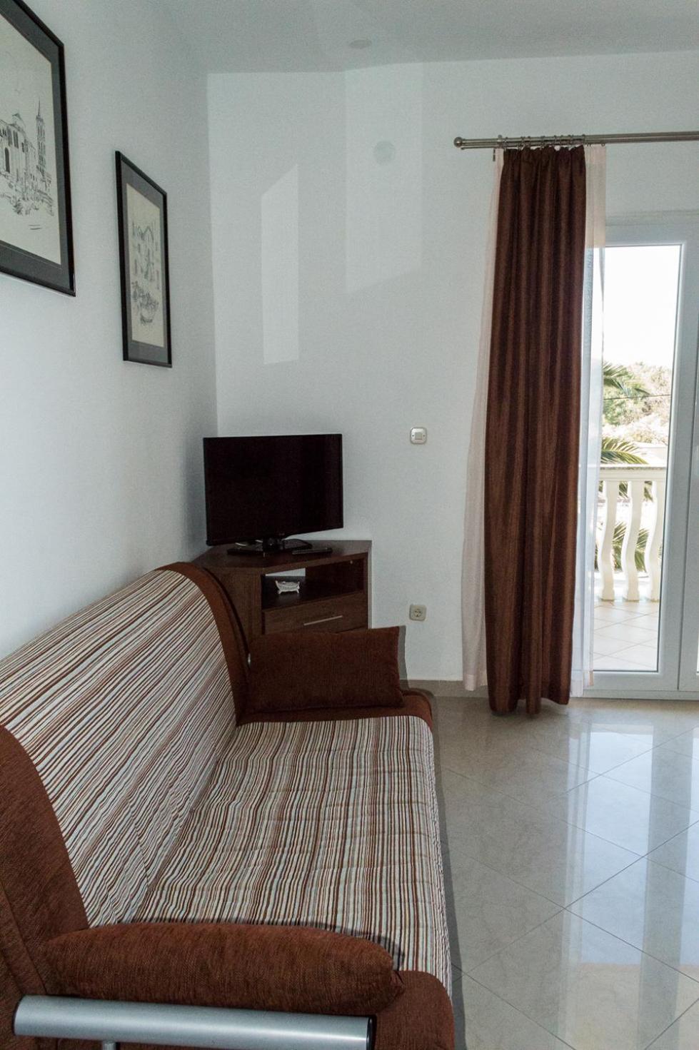 One-Bedroom Apartment with Balcony and Sea View
