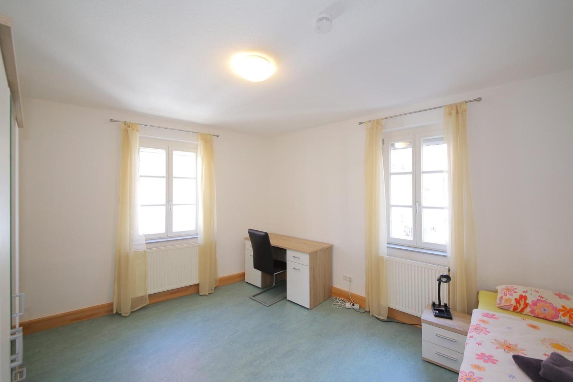 Three-Bedroom Apartment photo 1