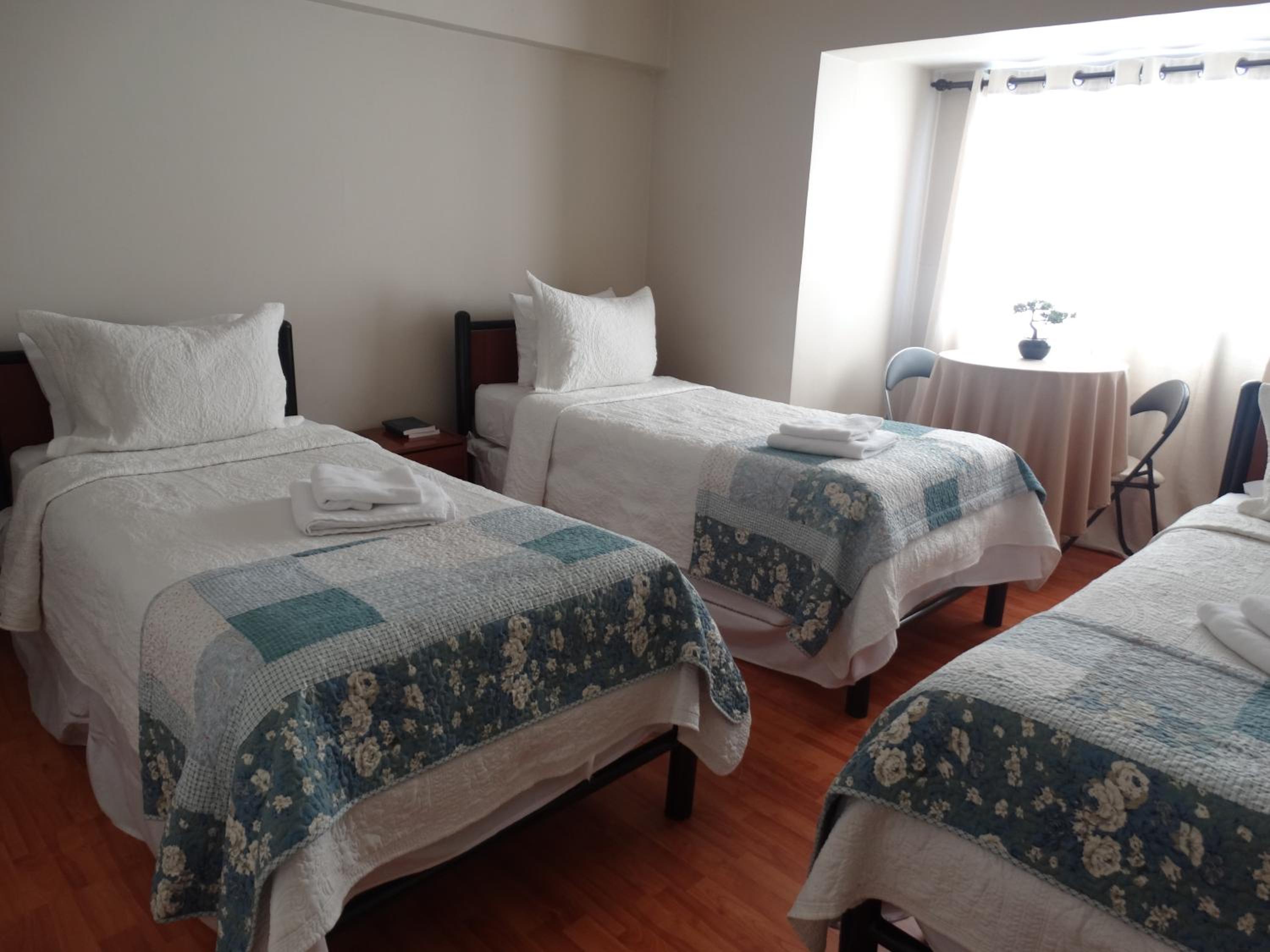 Triple Room with Shared Bathroom