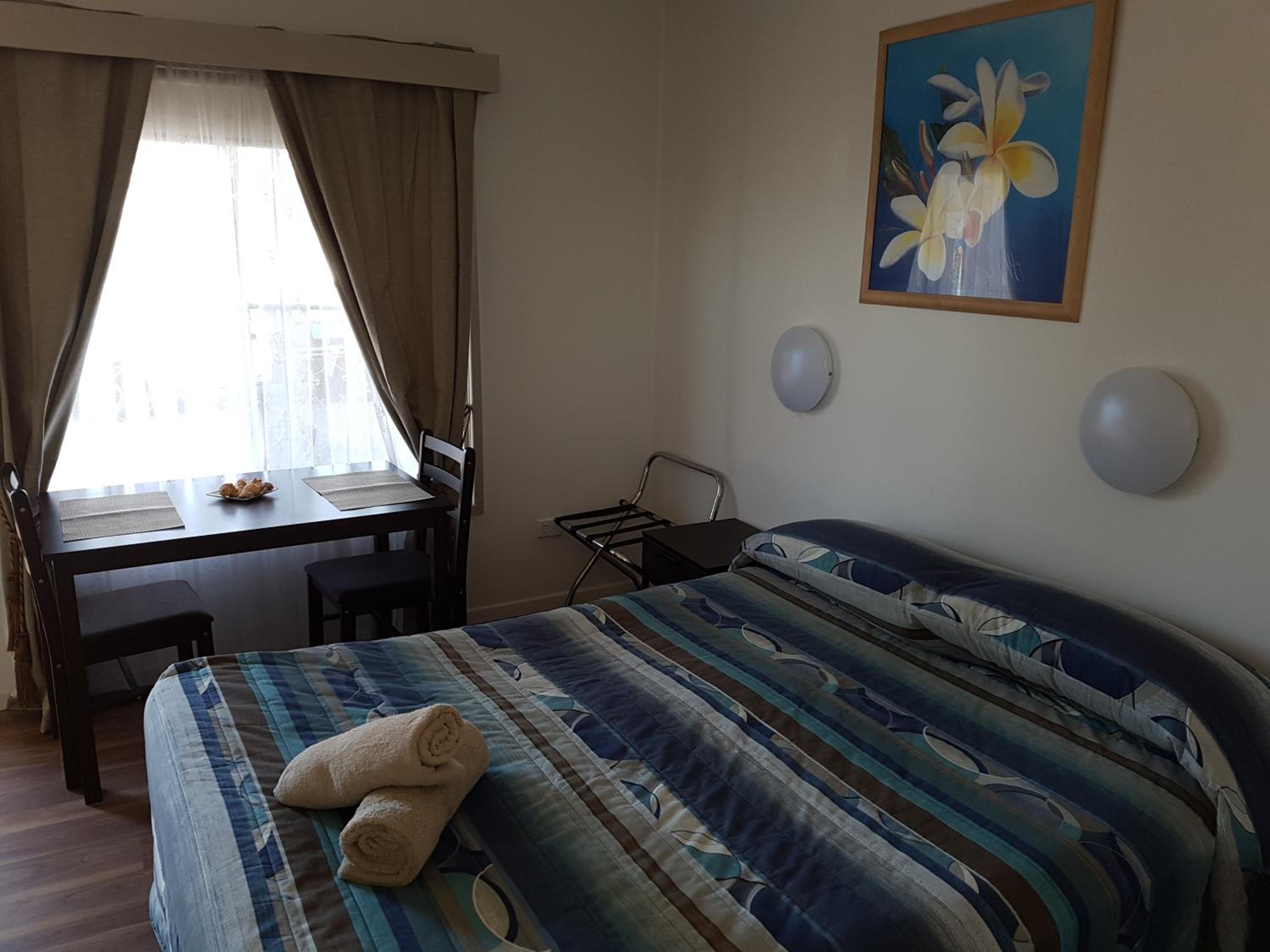 Queen Room - Pet Friendly photo 1