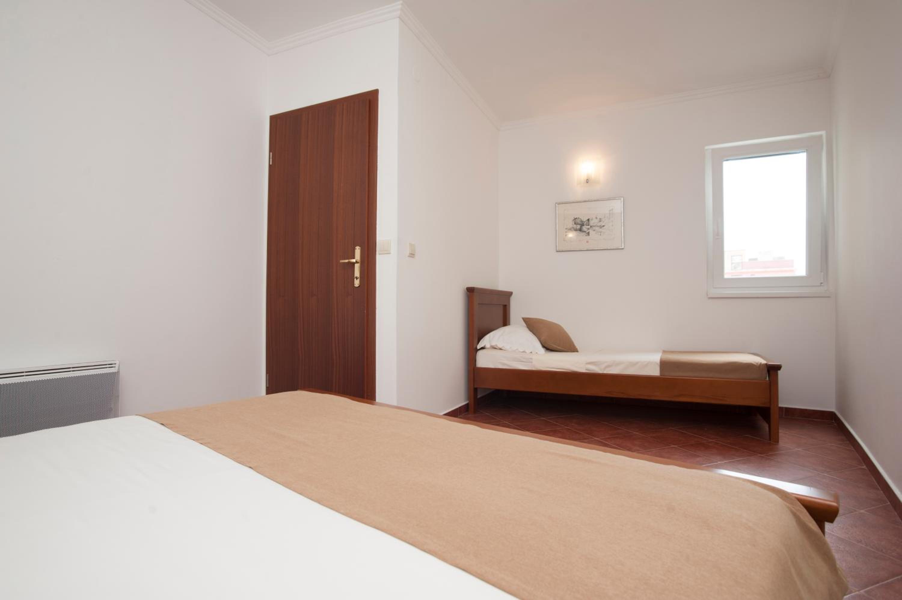 One-Bedroom Apartment with Balcony and Side Sea View photo 2