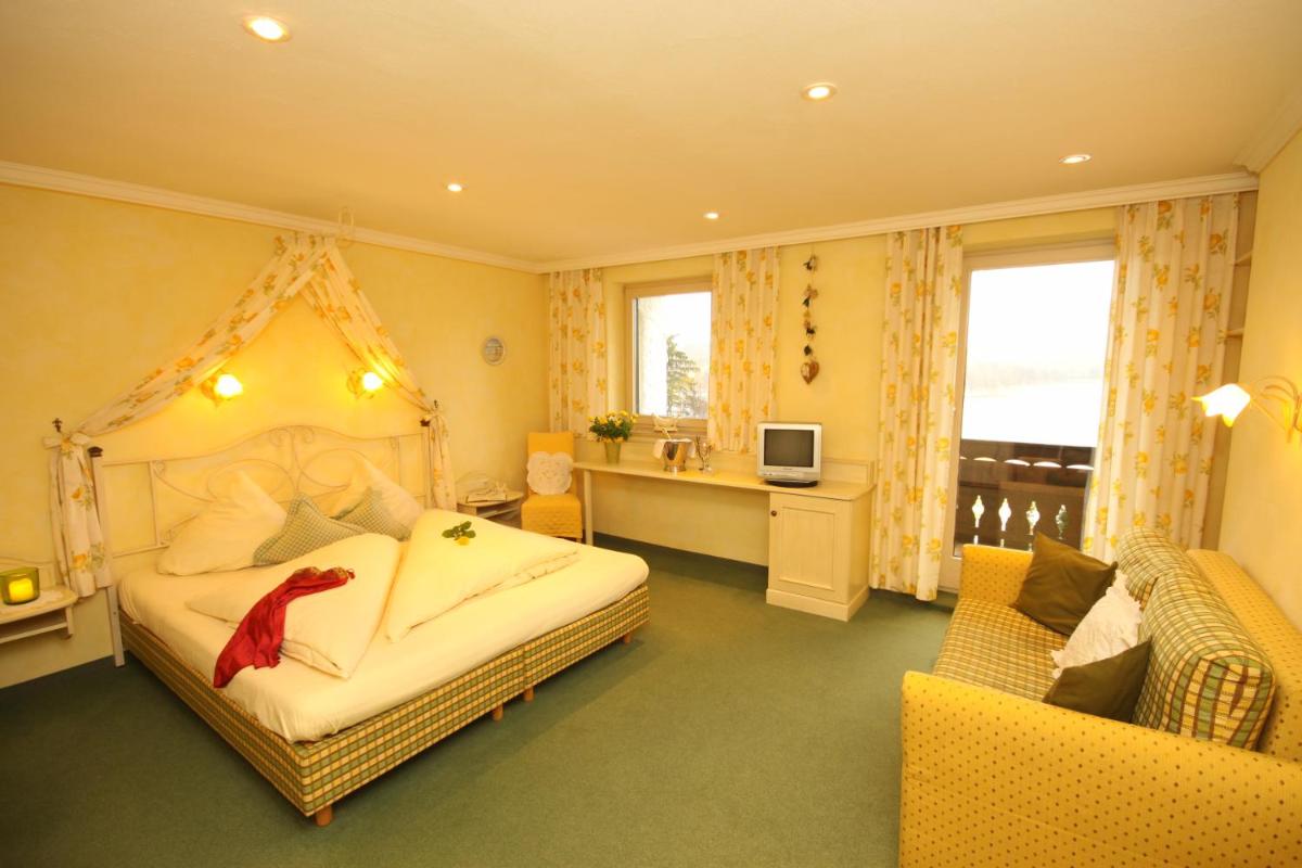Romantikzimmer mit Seeblick und Balkon