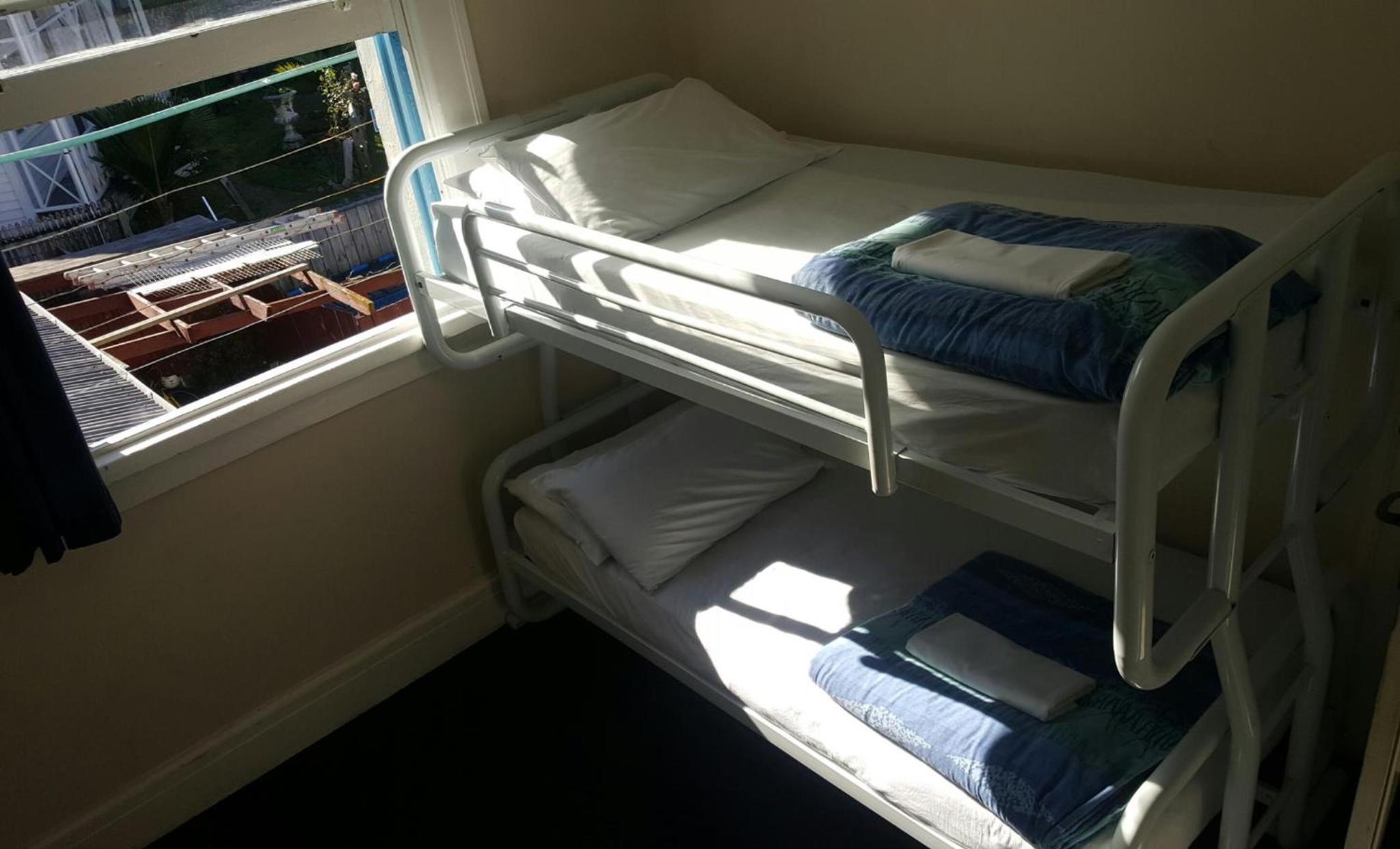 Twin Bunk Room with Shared Bathroom photo 1