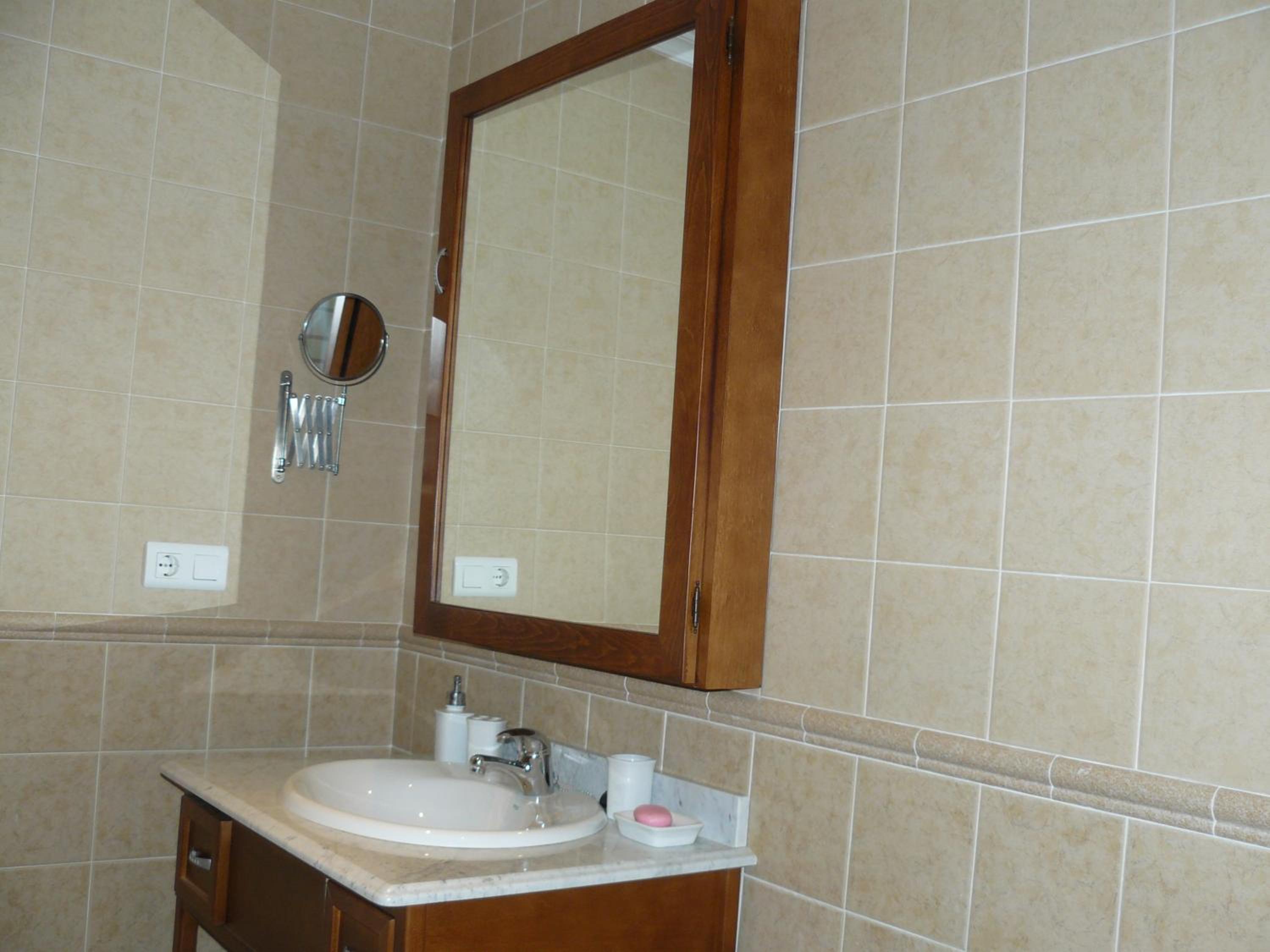 Three-Bedroom House - Photo 40
