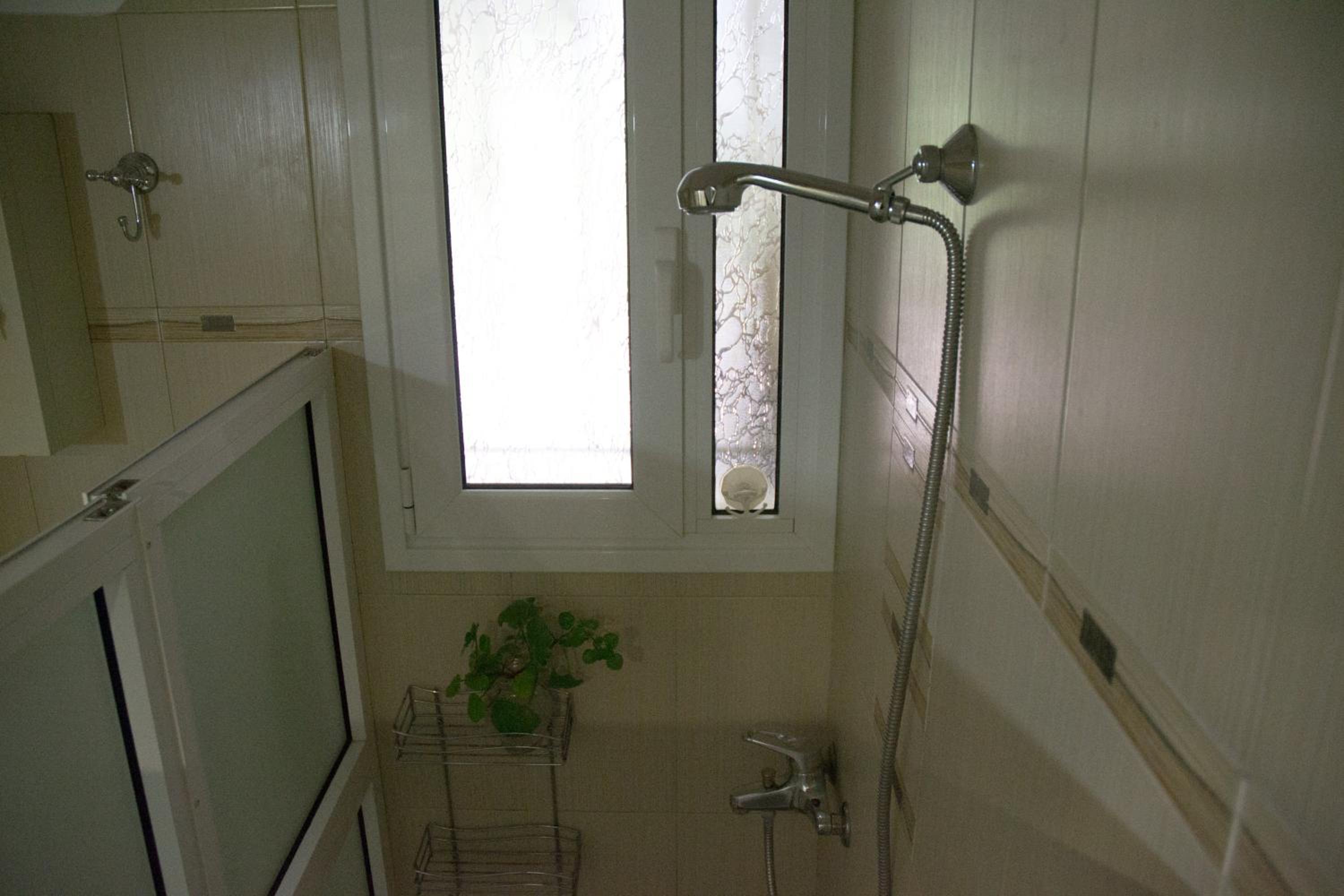 Three-Bedroom House - Photo 19