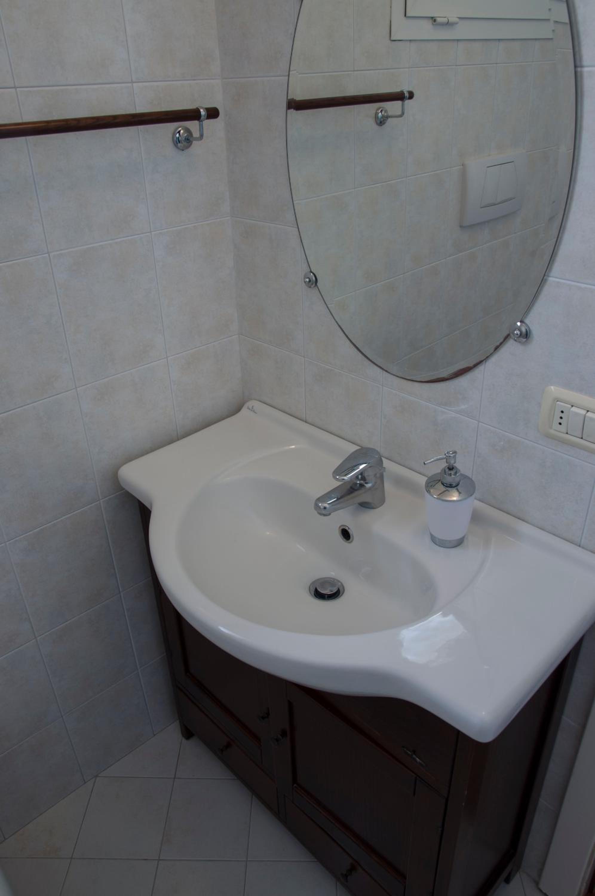 Three-Bedroom Apartment - Photo 32