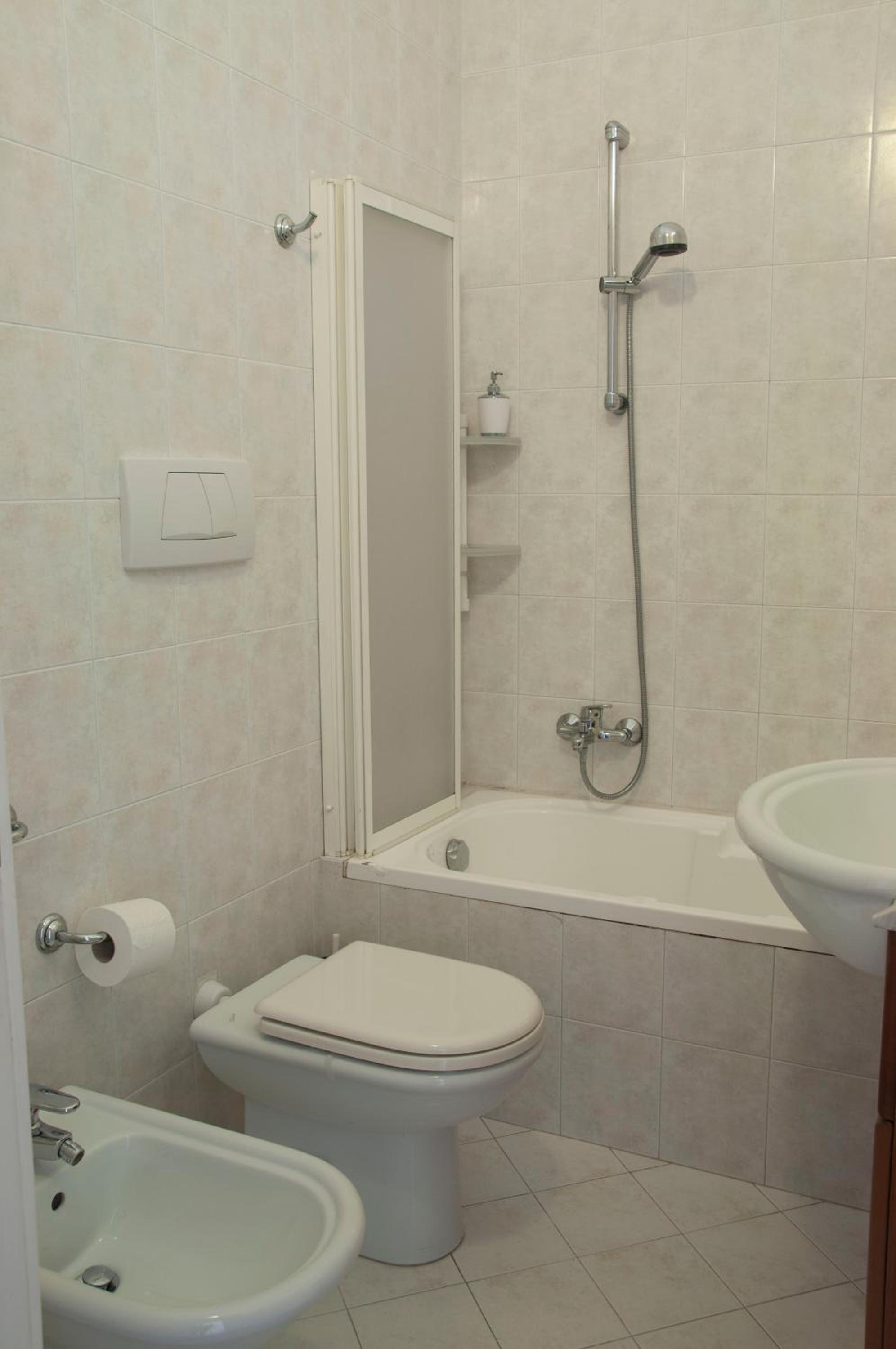 Three-Bedroom Apartment - Photo 26