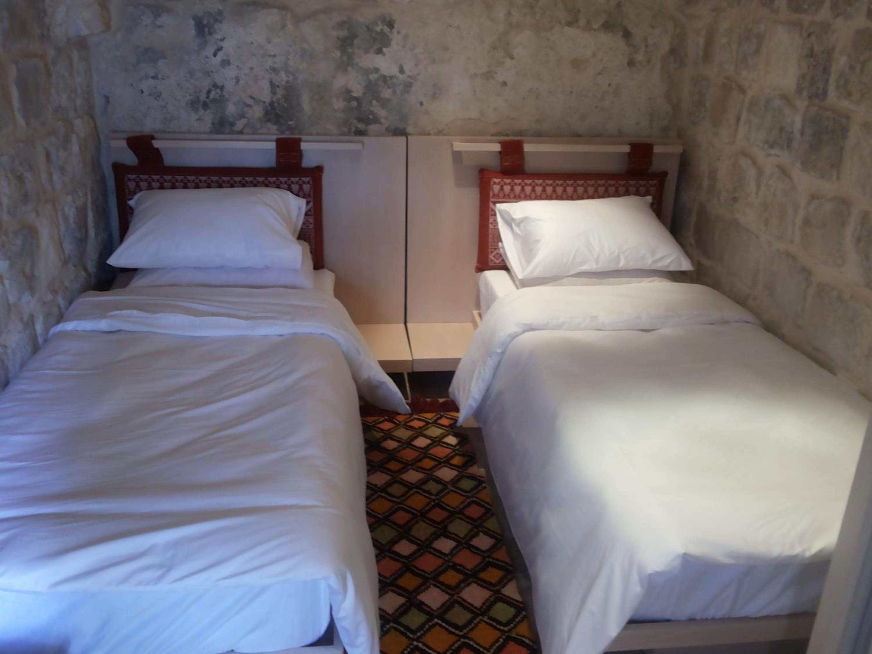 Single Bed In Female Dormitory Room