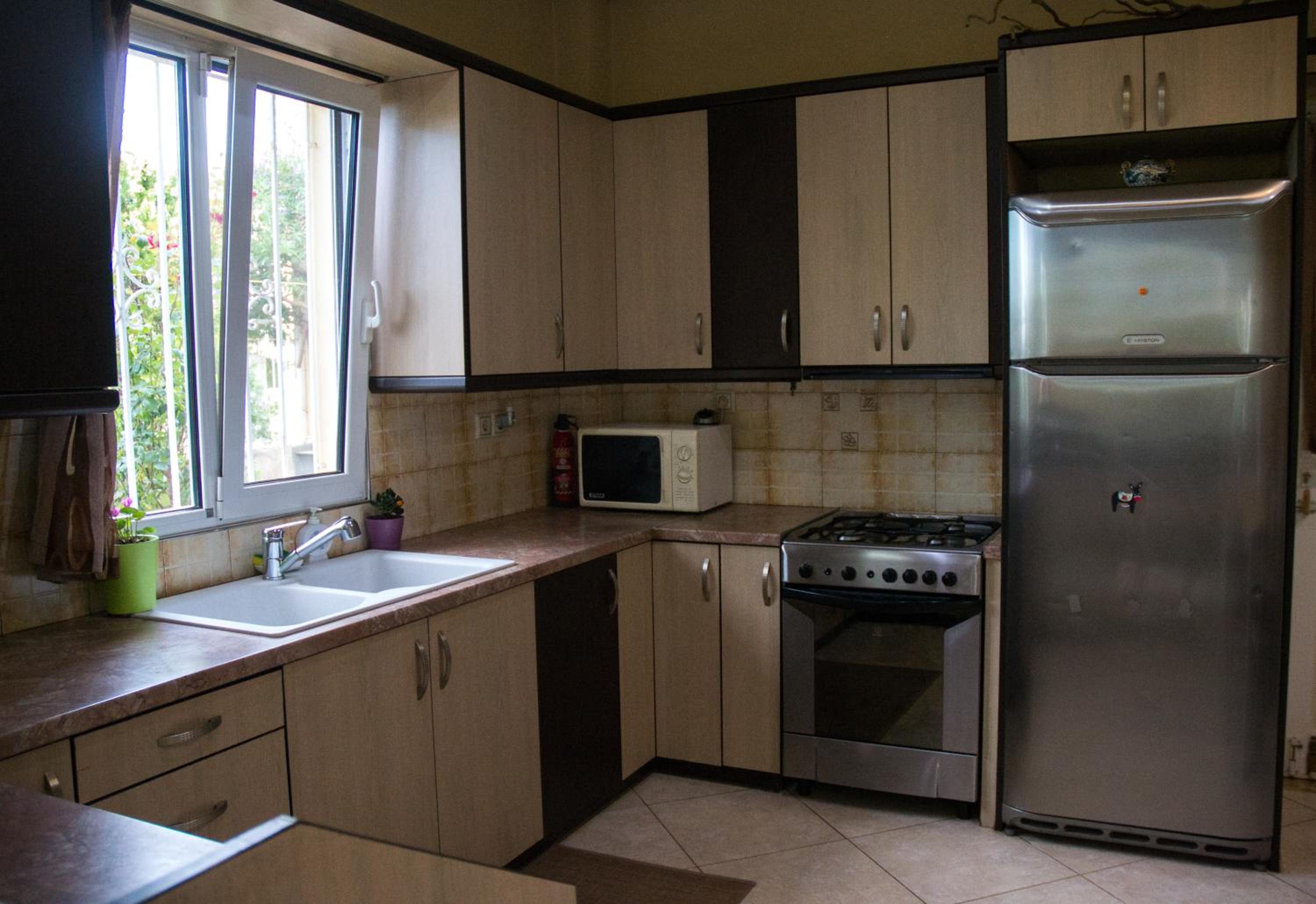 Three-Bedroom House - Photo 23