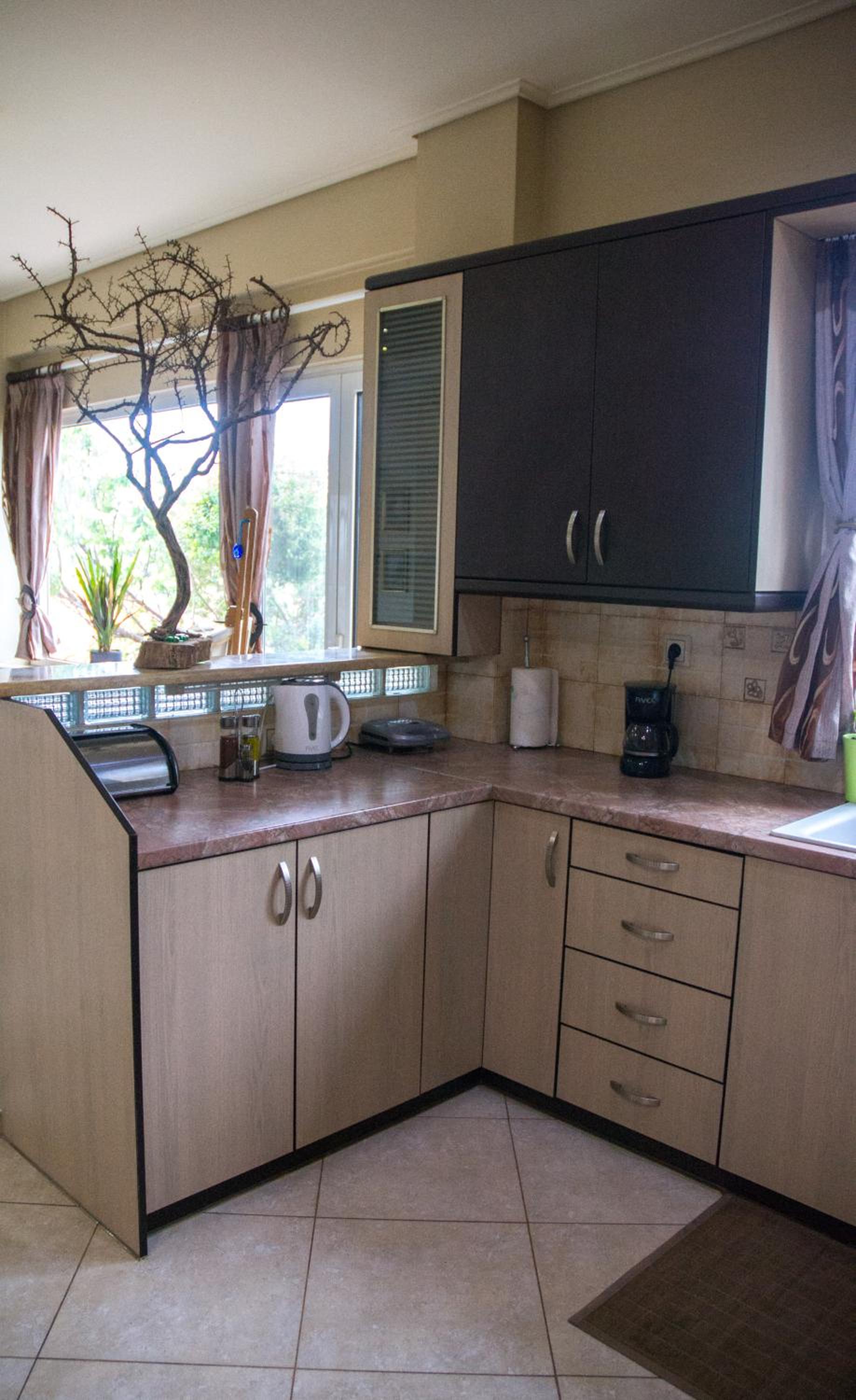 Three-Bedroom House - Photo 26
