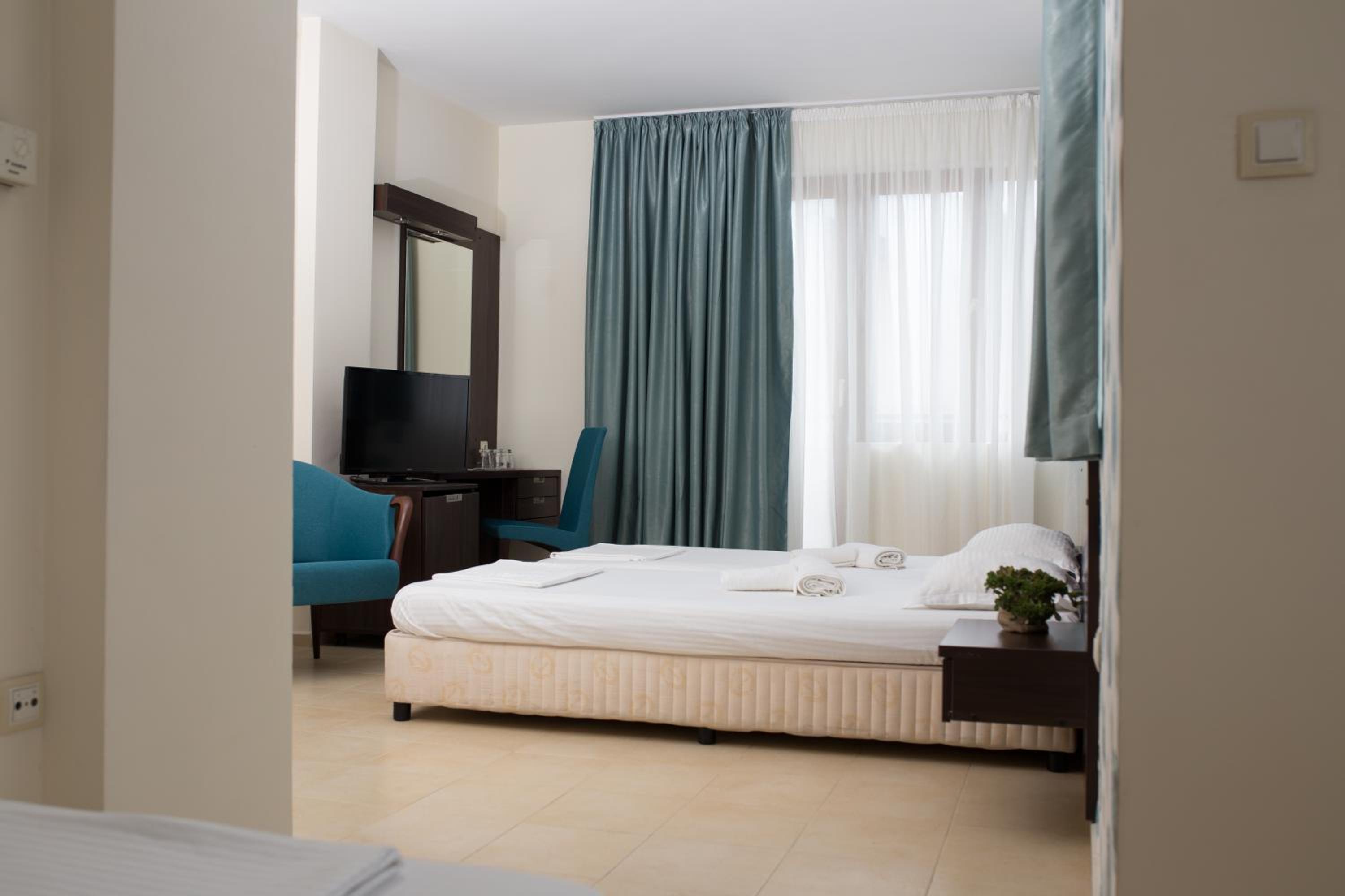 Junior Suite with Balcony and City View