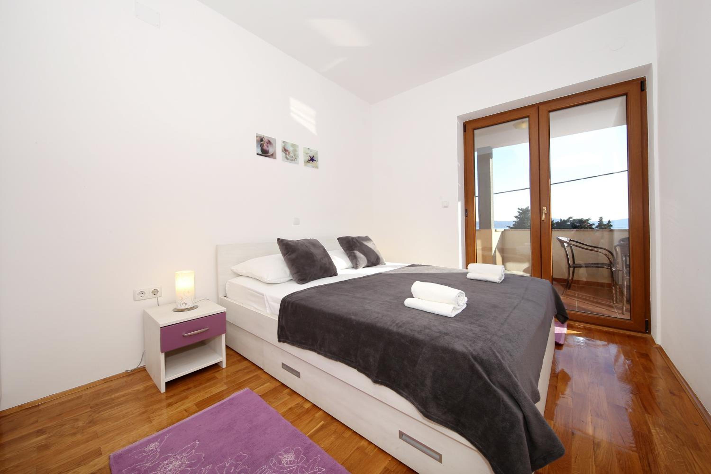 One-Bedroom Apartment with Balcony and Sea View