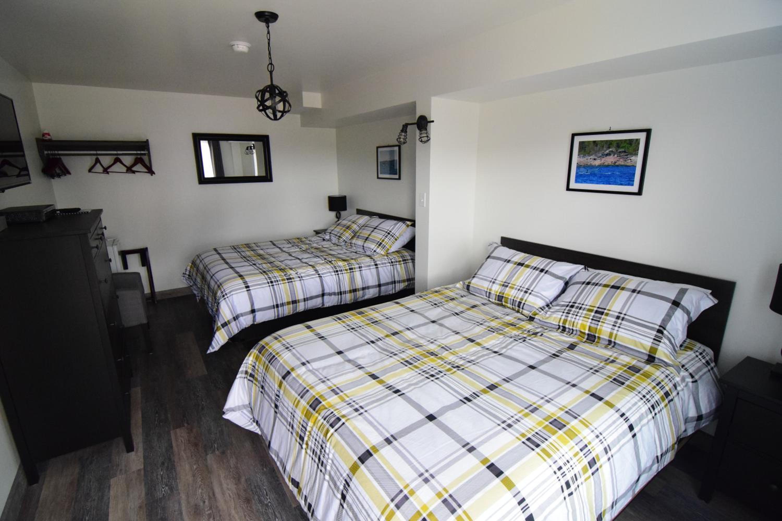 Standard Queen Room with Two Queen Beds - Photo 1