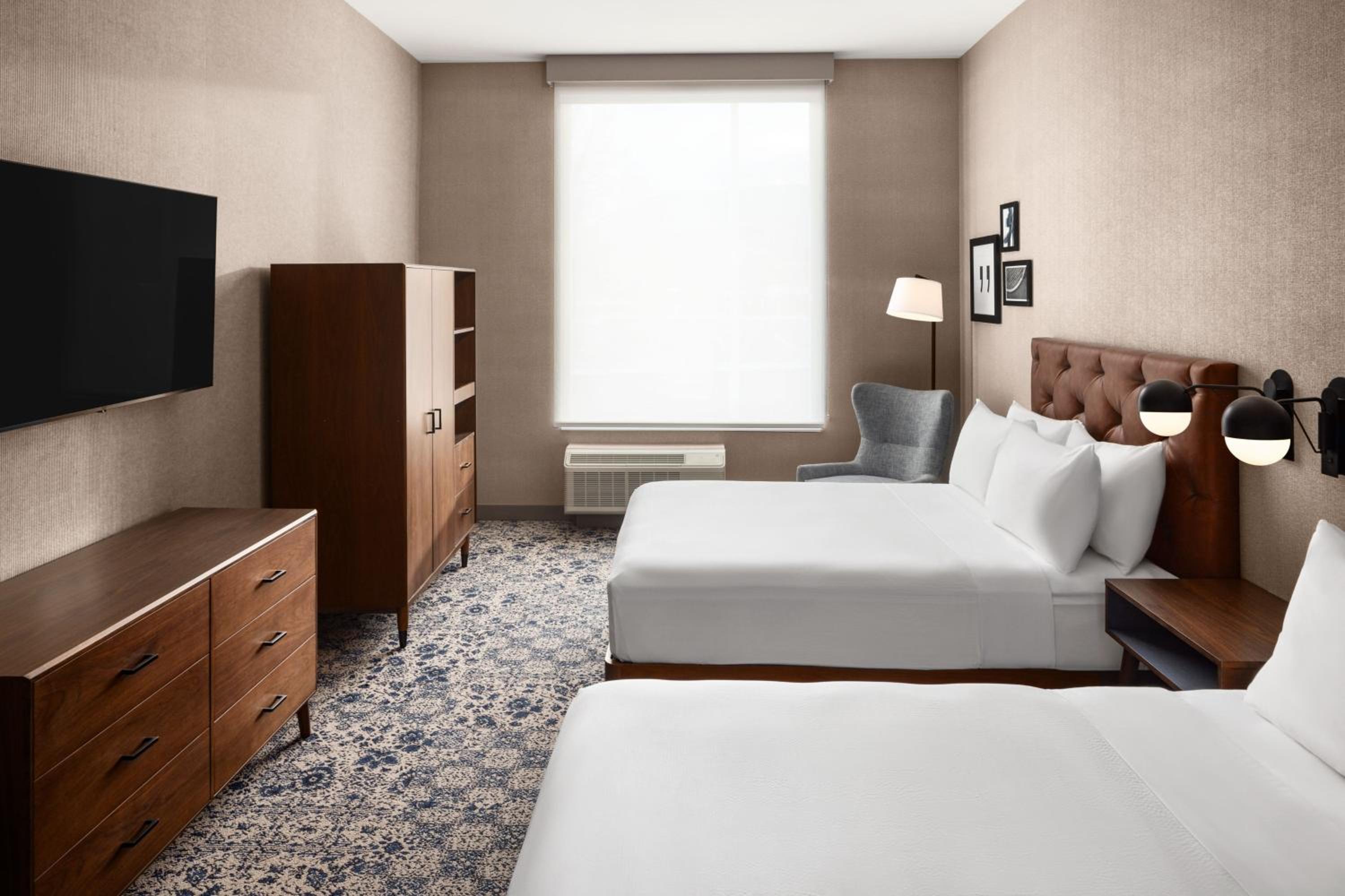 One-Bedroom Queen Suite with Two Queen Beds, Kitchenette and Sofa Bed