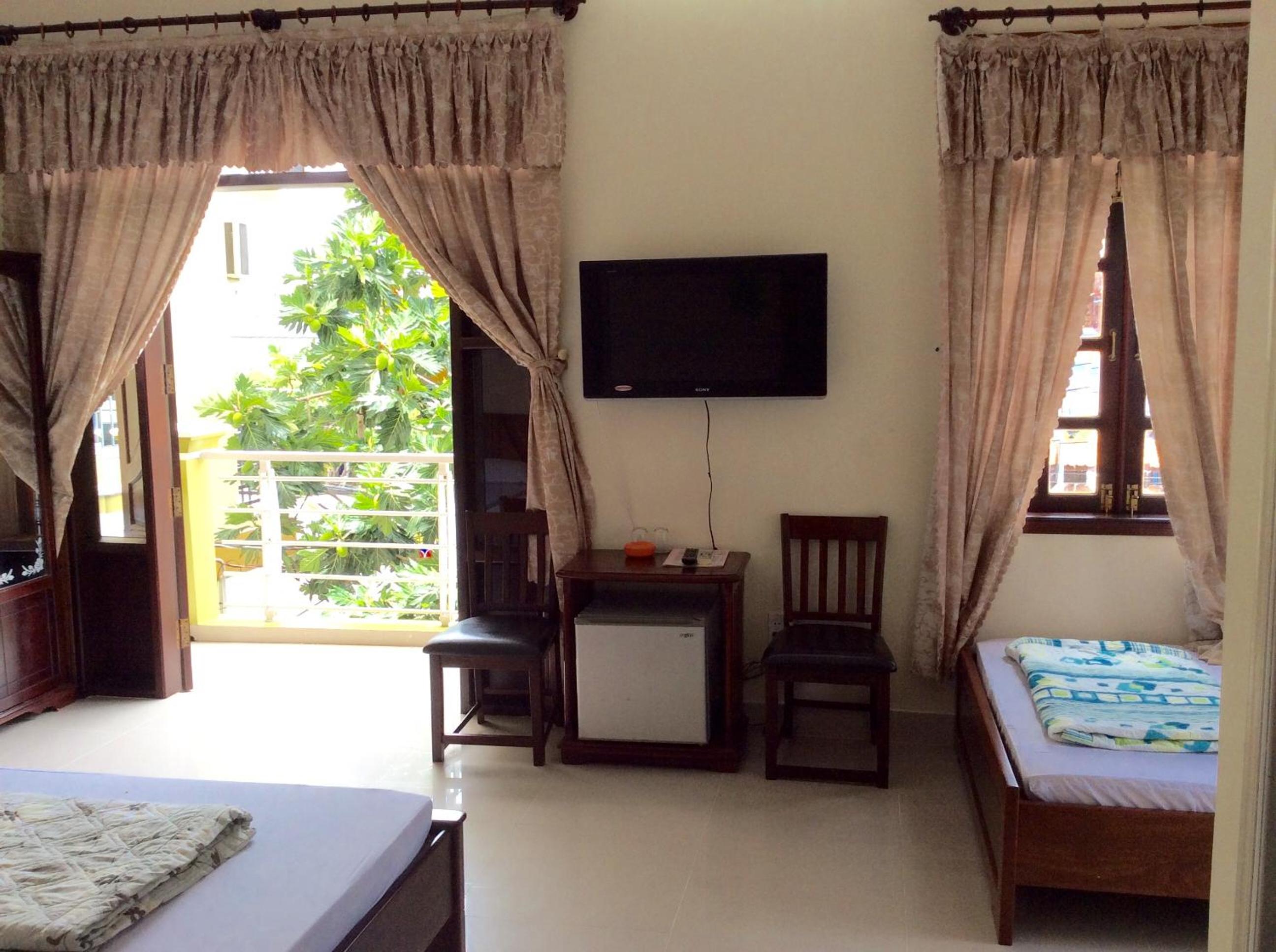Family Room with Balcony - Photo 1