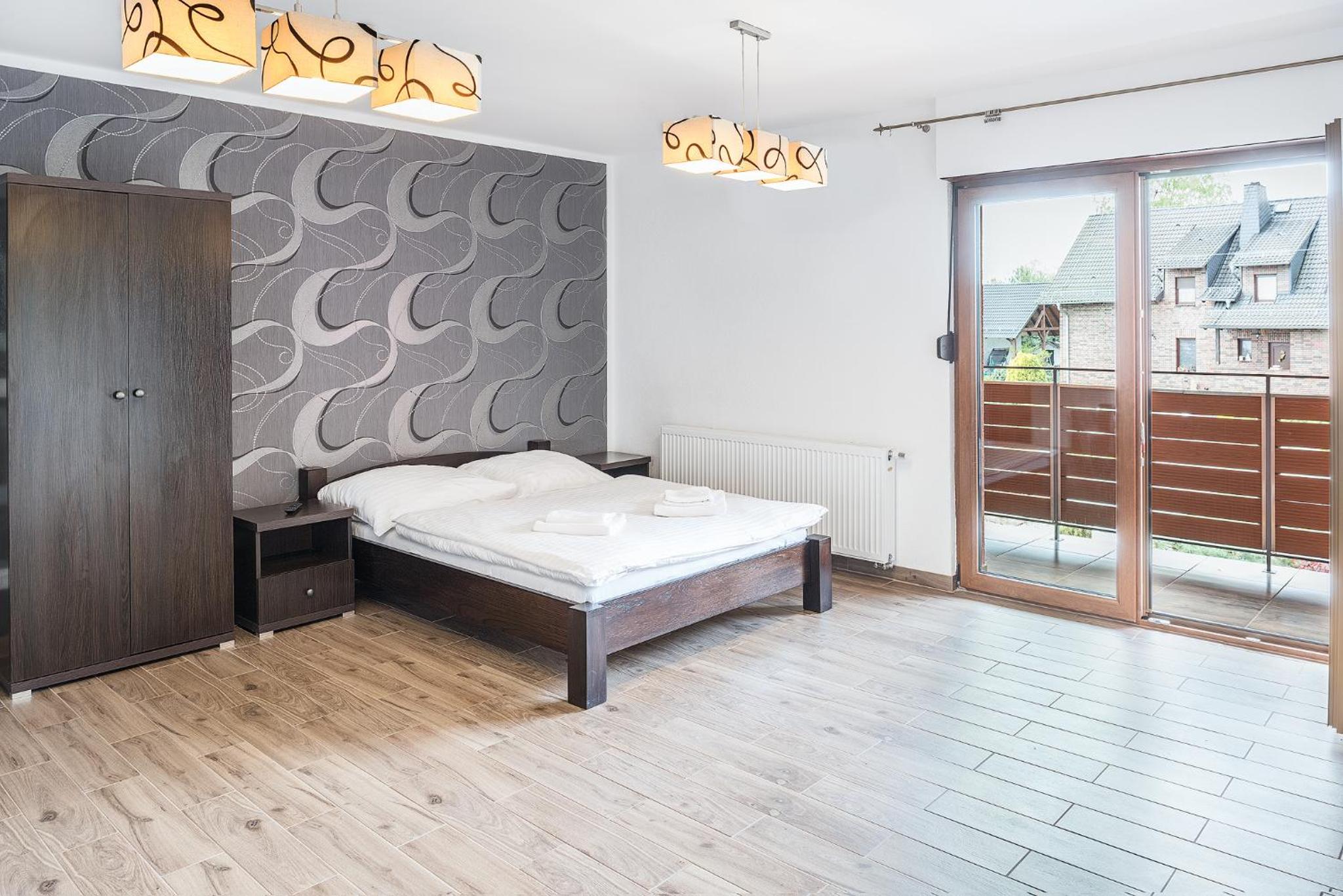 Apartment with Balcony - Photo 1
