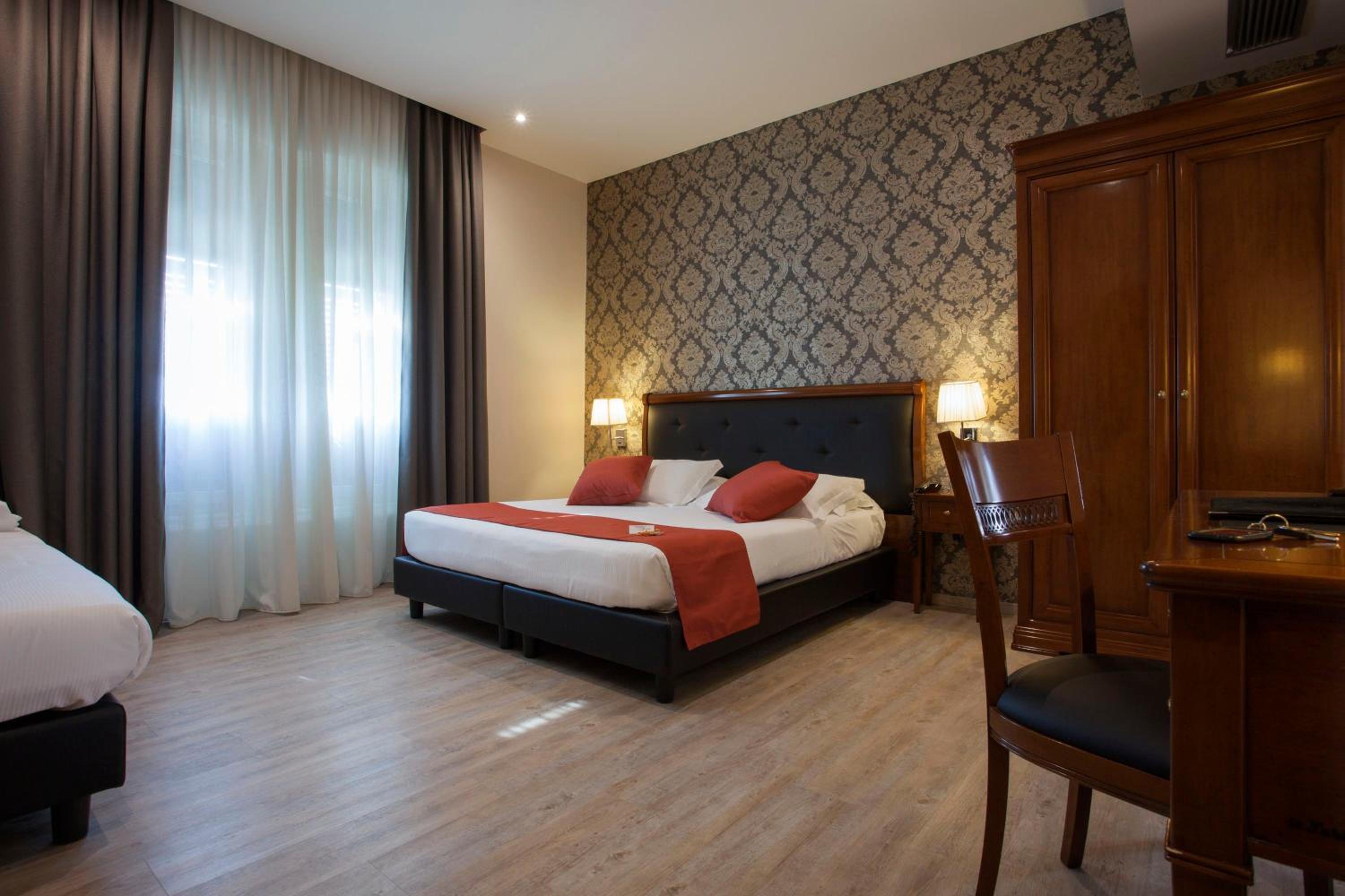 Quarto Triplo com Vista para o Mar