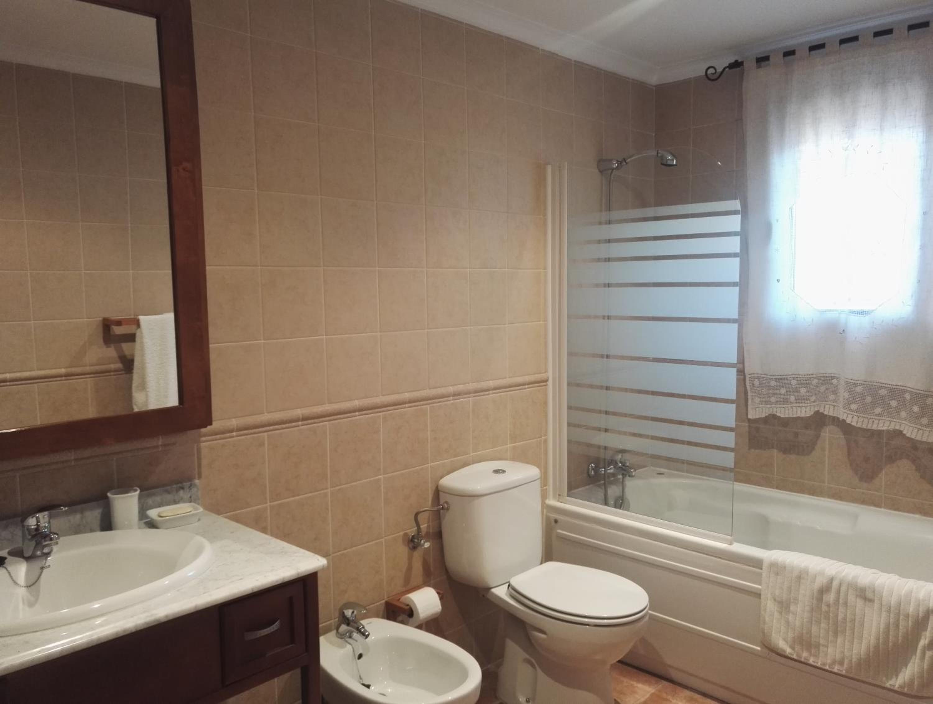 Three-Bedroom House - Photo 14