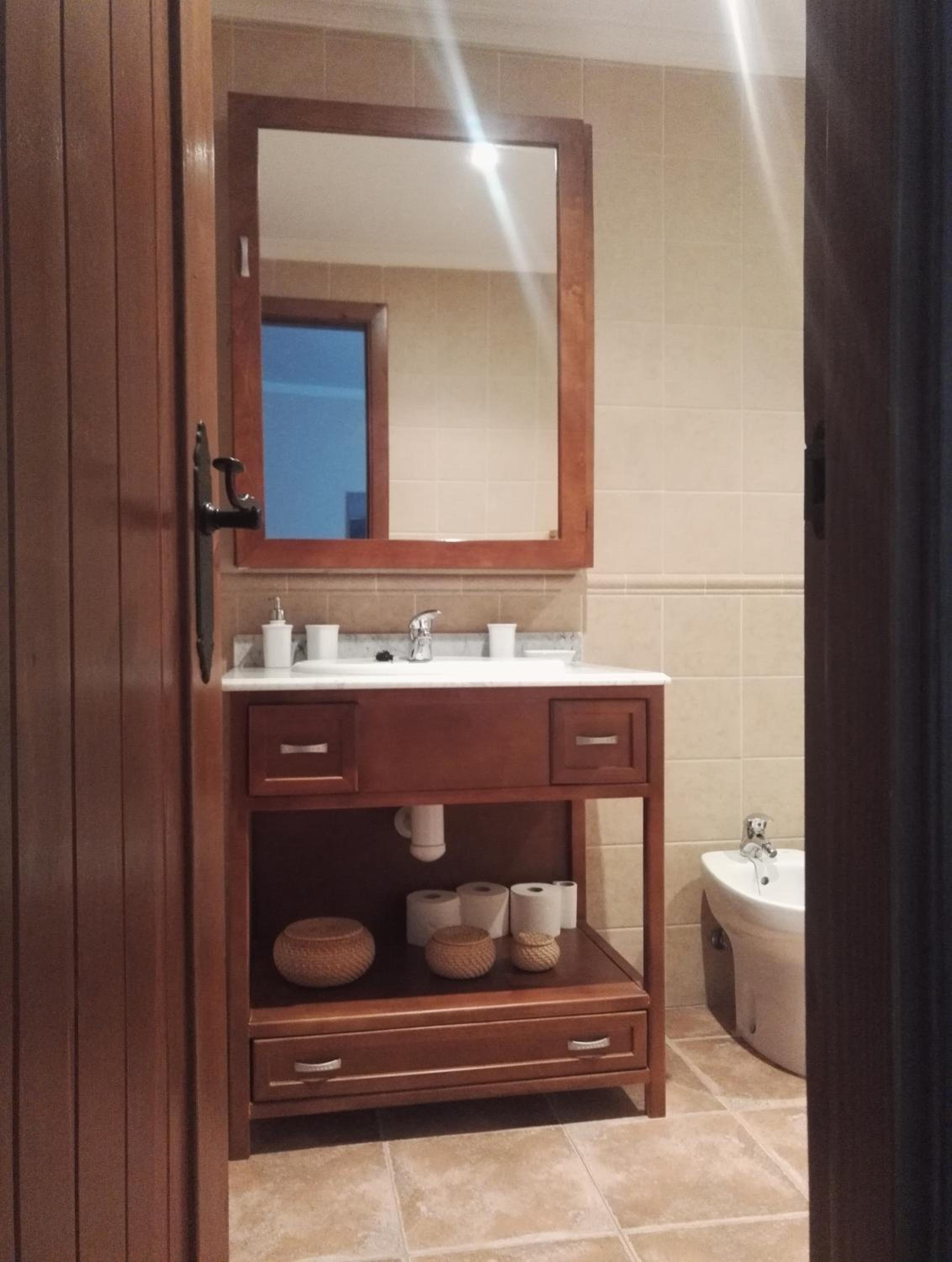 Three-Bedroom House - Photo 15