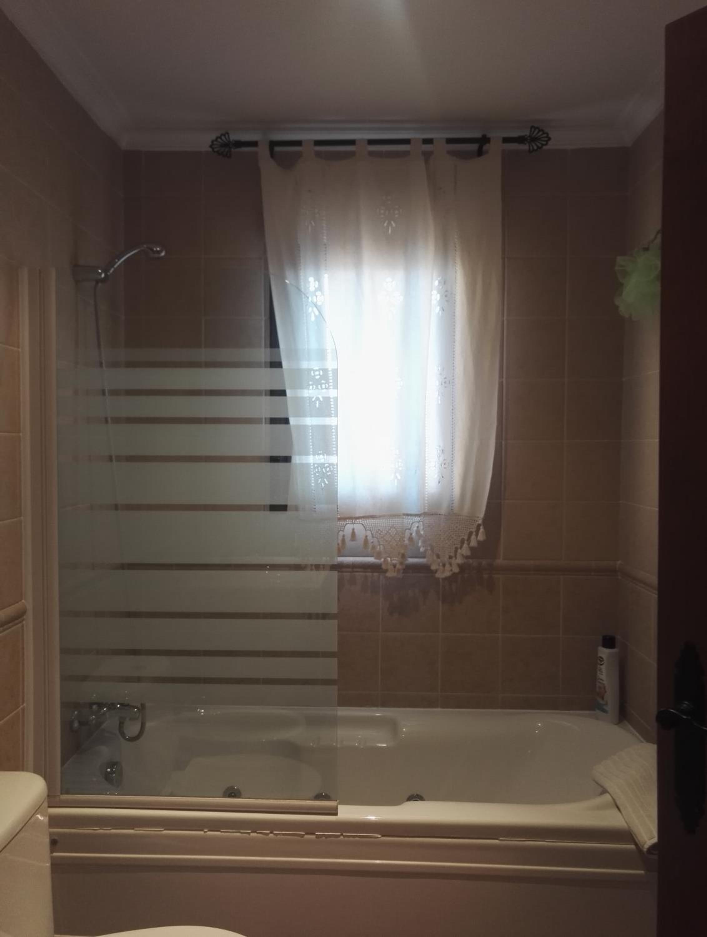 Three-Bedroom House - Photo 28