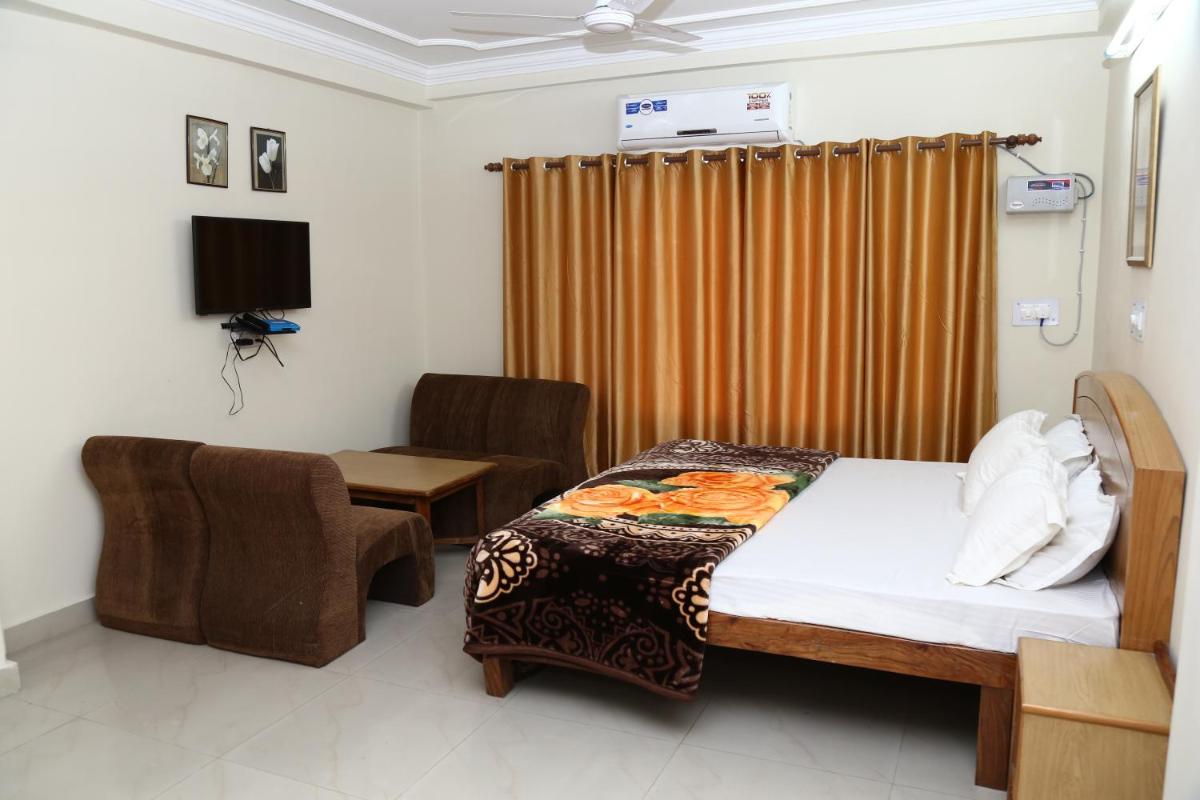 Deluxe Double Room (2 Adults + 1 Child) photo 2