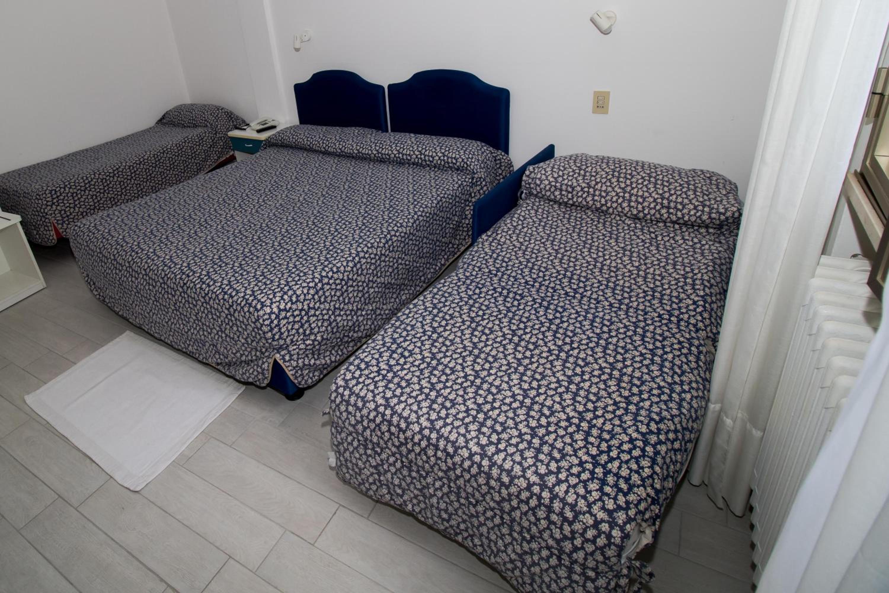 Quadruple Room with Private Bathroom