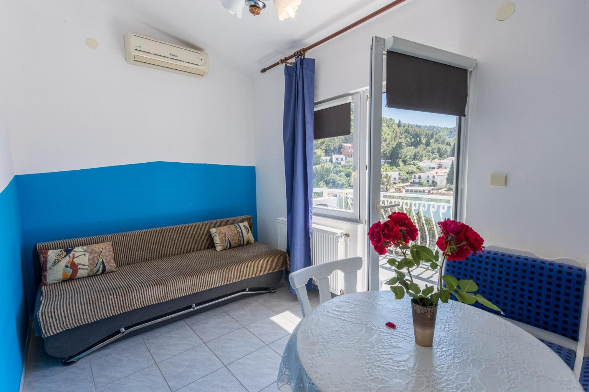 One-Bedroom Apartment with Balcony and Sea View