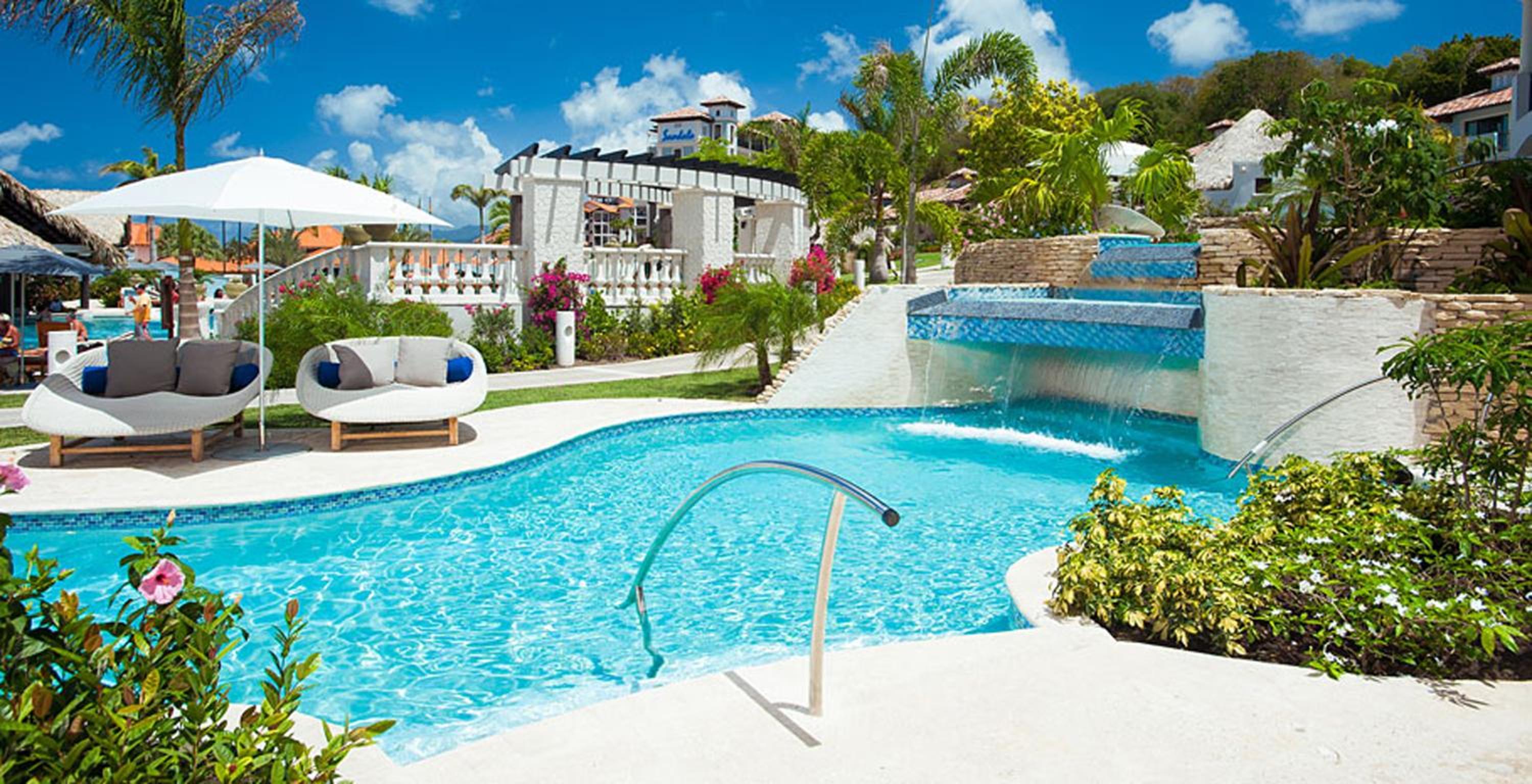 South Seas Waterfall River Pool Walkout Junior Suite with Patio Tranquility Soaking Tub (WWJS) photo 1