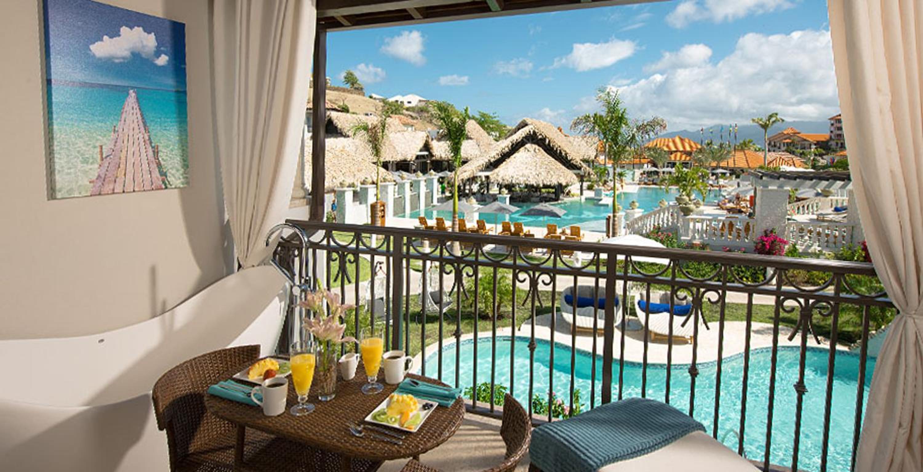 South Seas Waterfall River Pool Junior Suite with Balcony Tranquility Soaking Tub (WFJS) photo 1