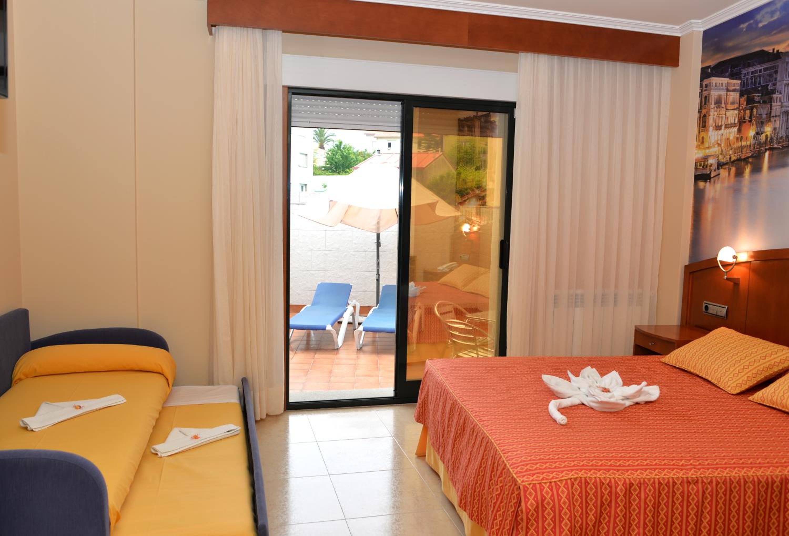 Habitación Doble (2 adultos + 2 niños)