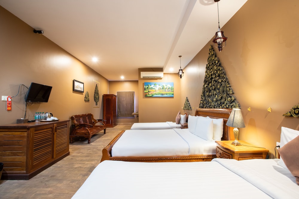 Deluxe Triple Room - Photo 12